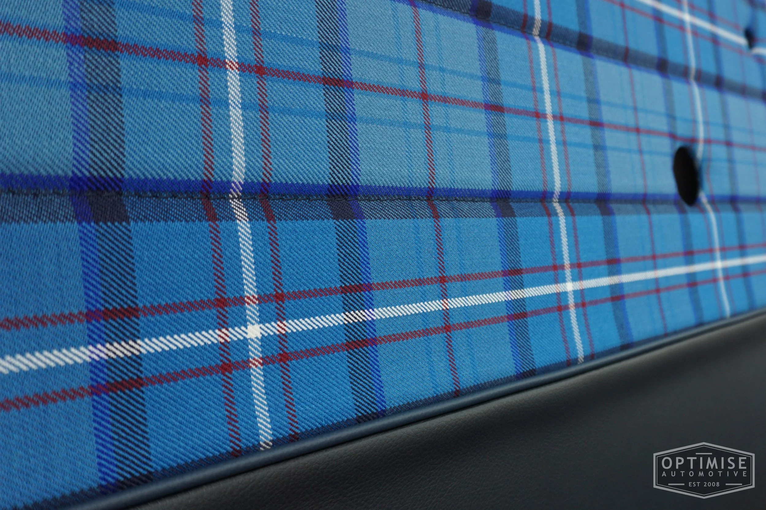 Classic Mini Monte-Carlo Plus door cards, trimmed in black vinyl leatherette and Royal Air Force Tartan cloth, with black piping & stitching.