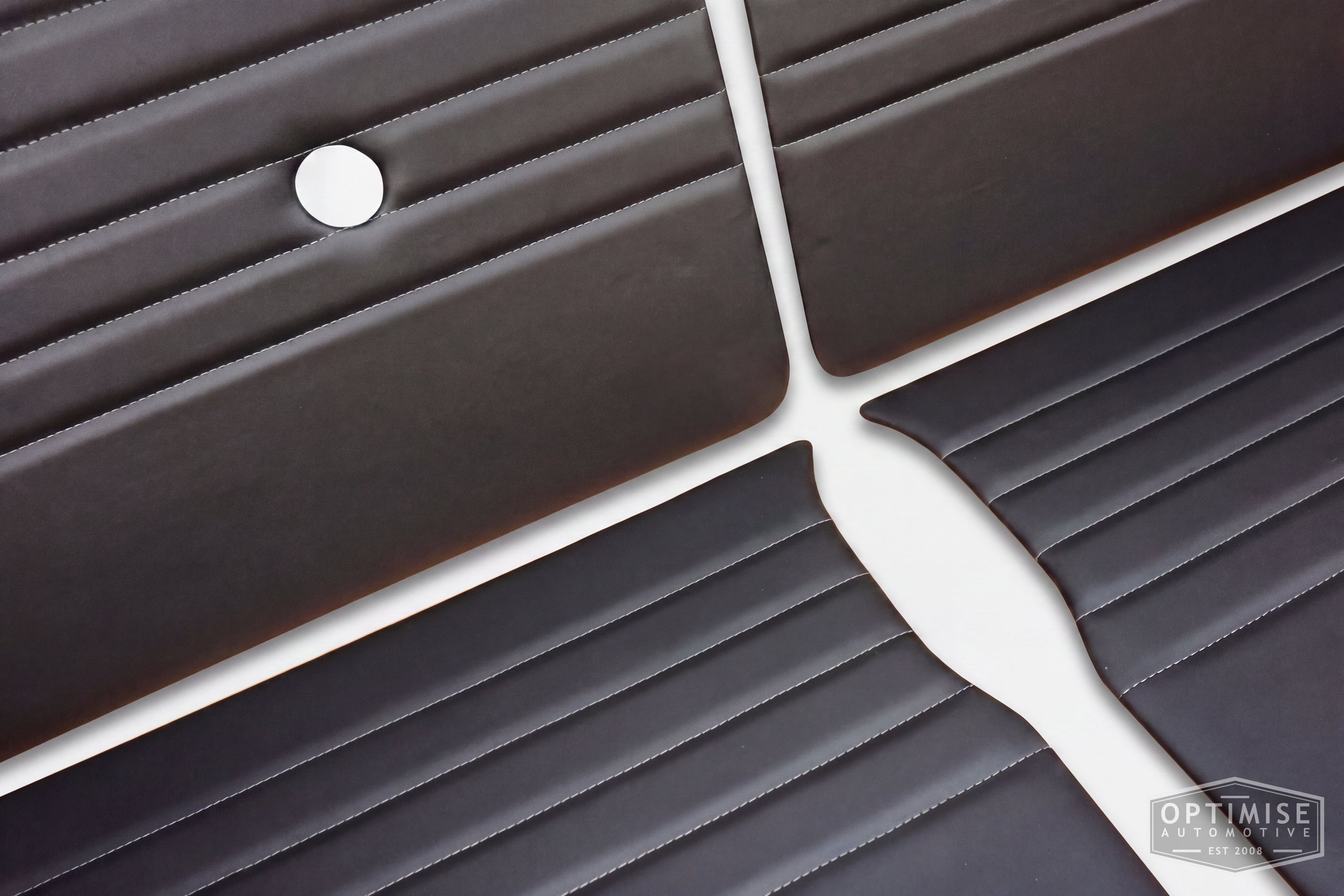 Classic Mini Monte-Carlo door cards, trimmed in black vinyl leatherette with dark grey stitching.