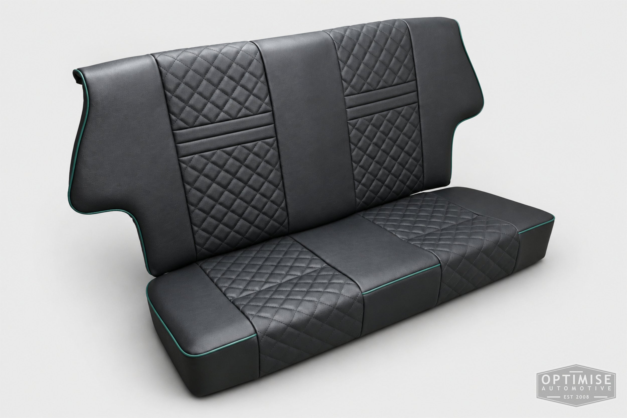 Classic Mini seat retrims featuring Cobra Le Mans front seats and a matching MK5 rear seat, trimmed in black leatherette with British Racing Green diamond stitching and matching green piping.