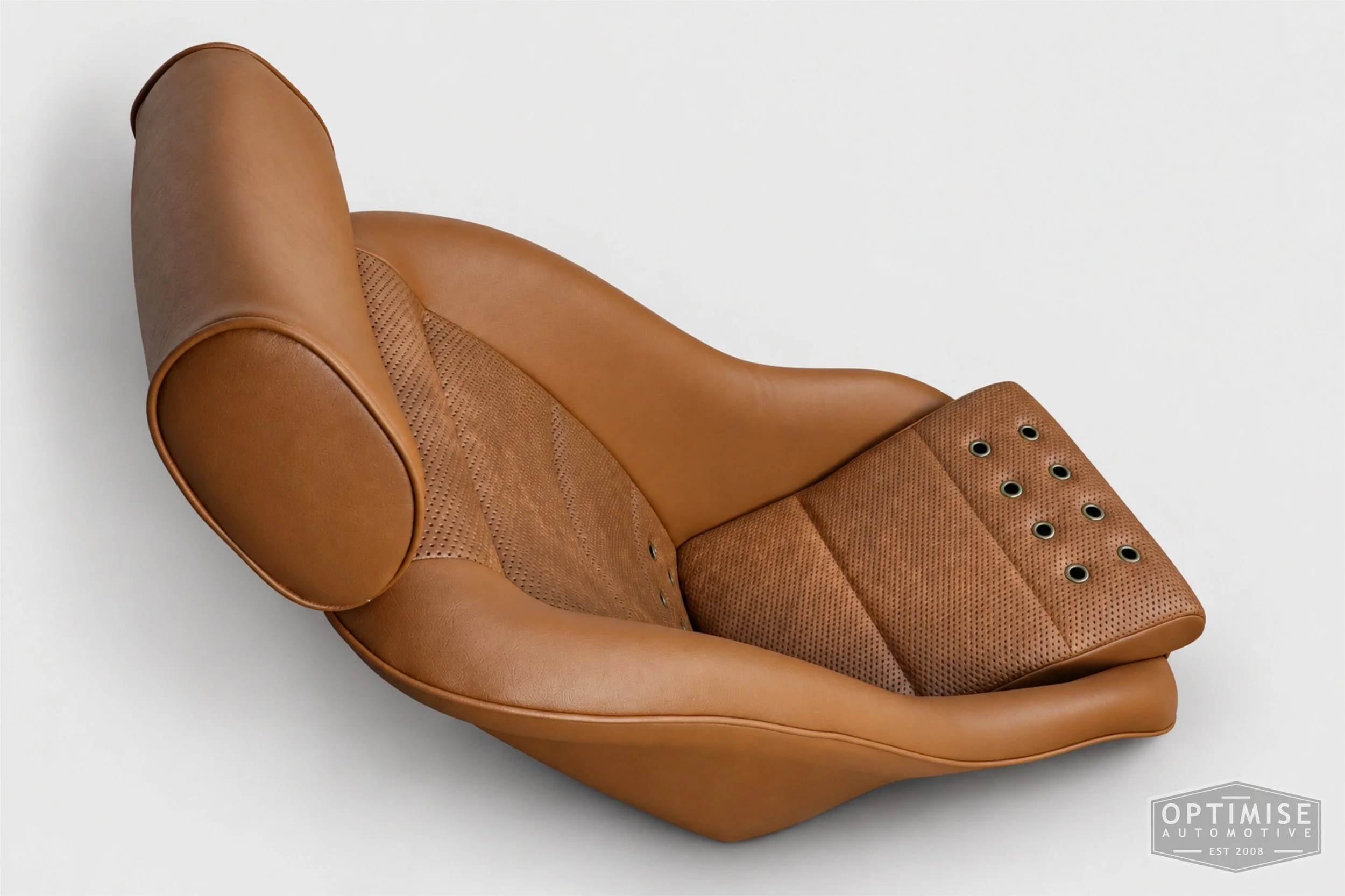 Classic Mini seat retrims featuring Cobra Classic front seats, trimmed in tan leatherette and tan basketweave  with bronze eyelets.