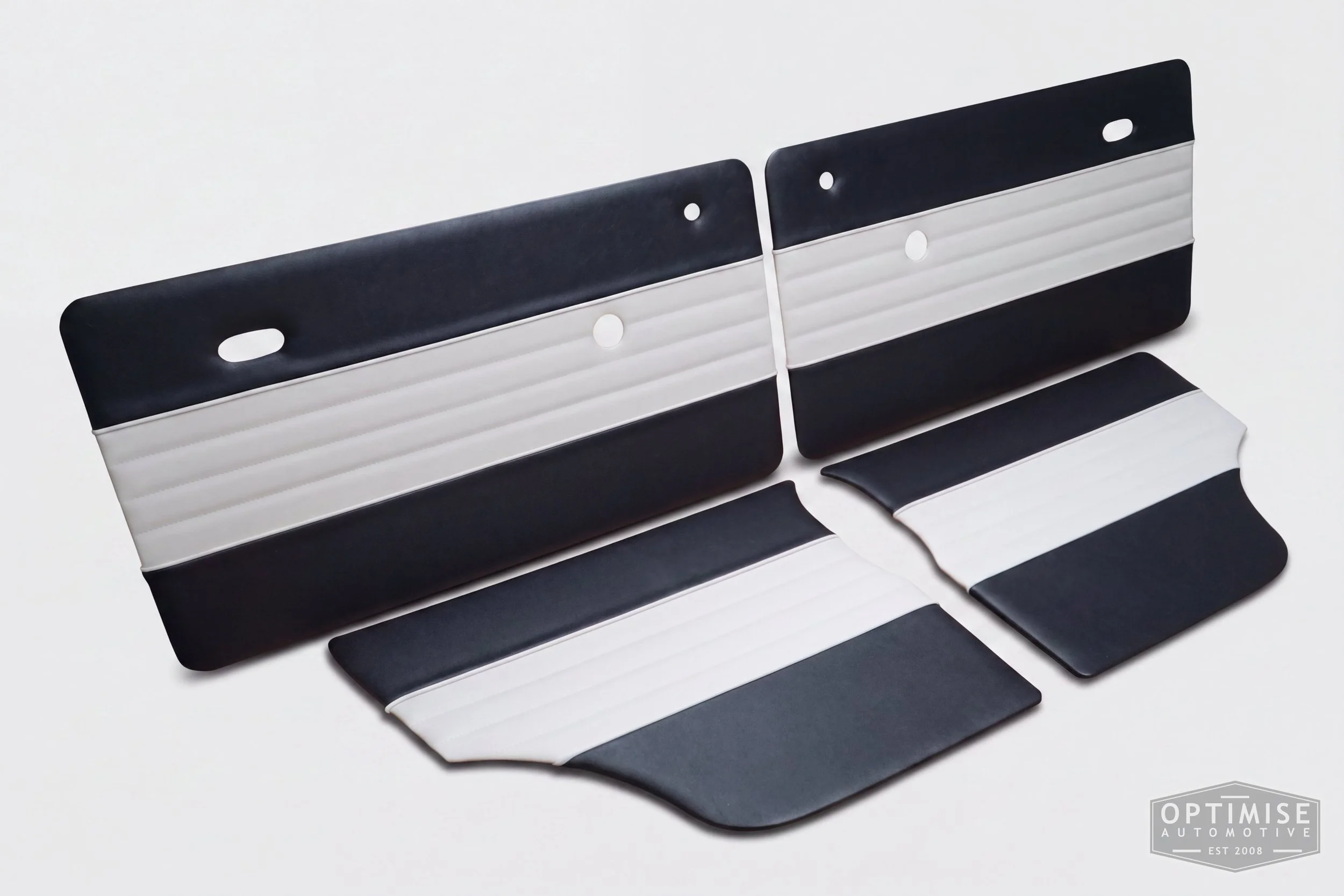 Classic Mini Wide-Stripe Fluted door cards, trimmed in black and off-white vinyl leatherette with off-white piping & stitching.