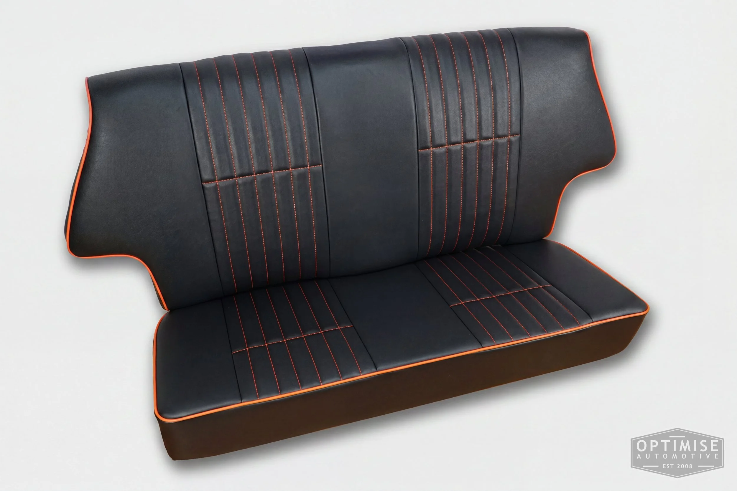 Classic Mini non-reclining seat retrims, trimmed in black leatherette with orange piping and orange stitching.