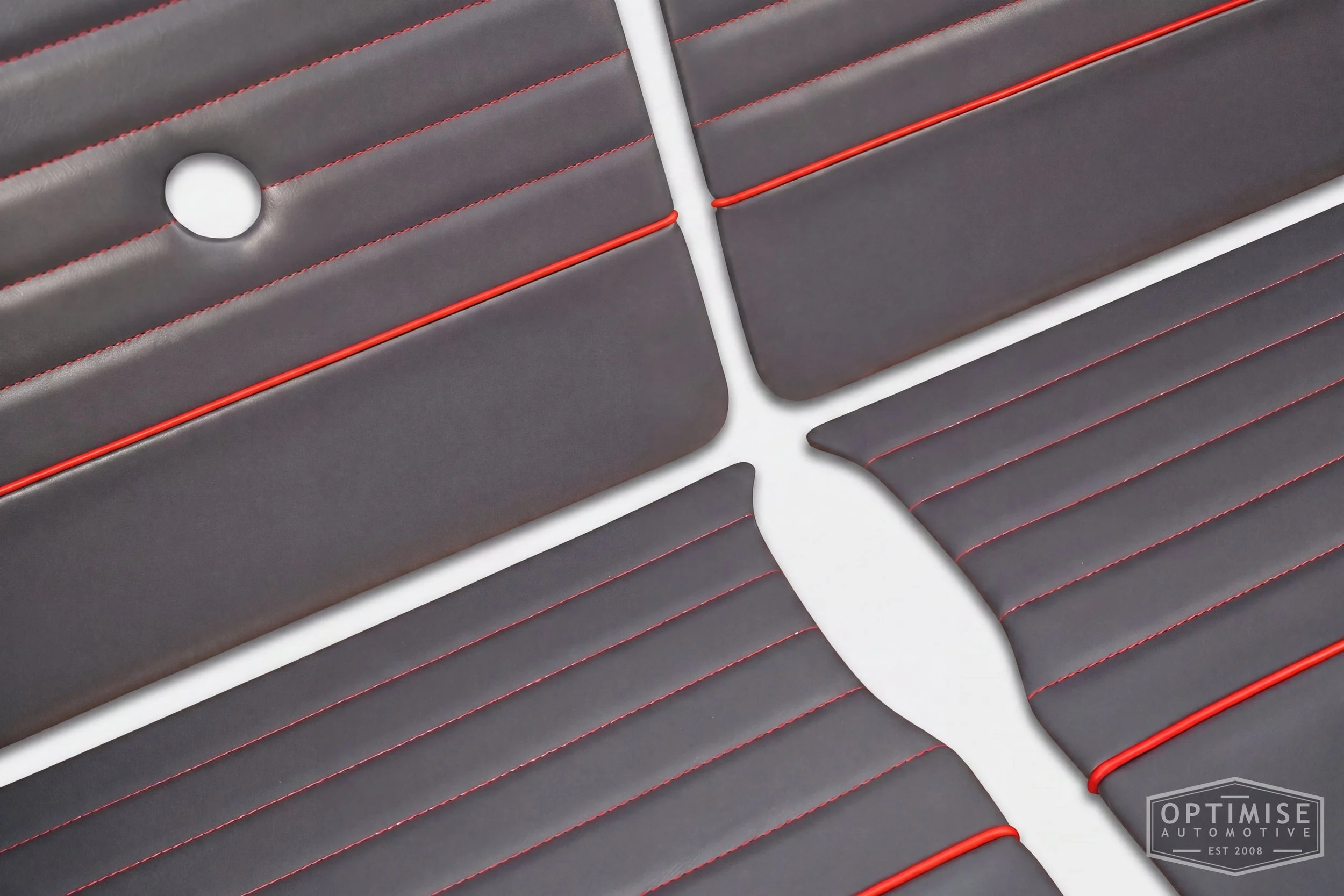 Classic Mini Monte-Carlo Plus door cards, trimmed in dark grey vinyl leatherette with red piping & stitching.