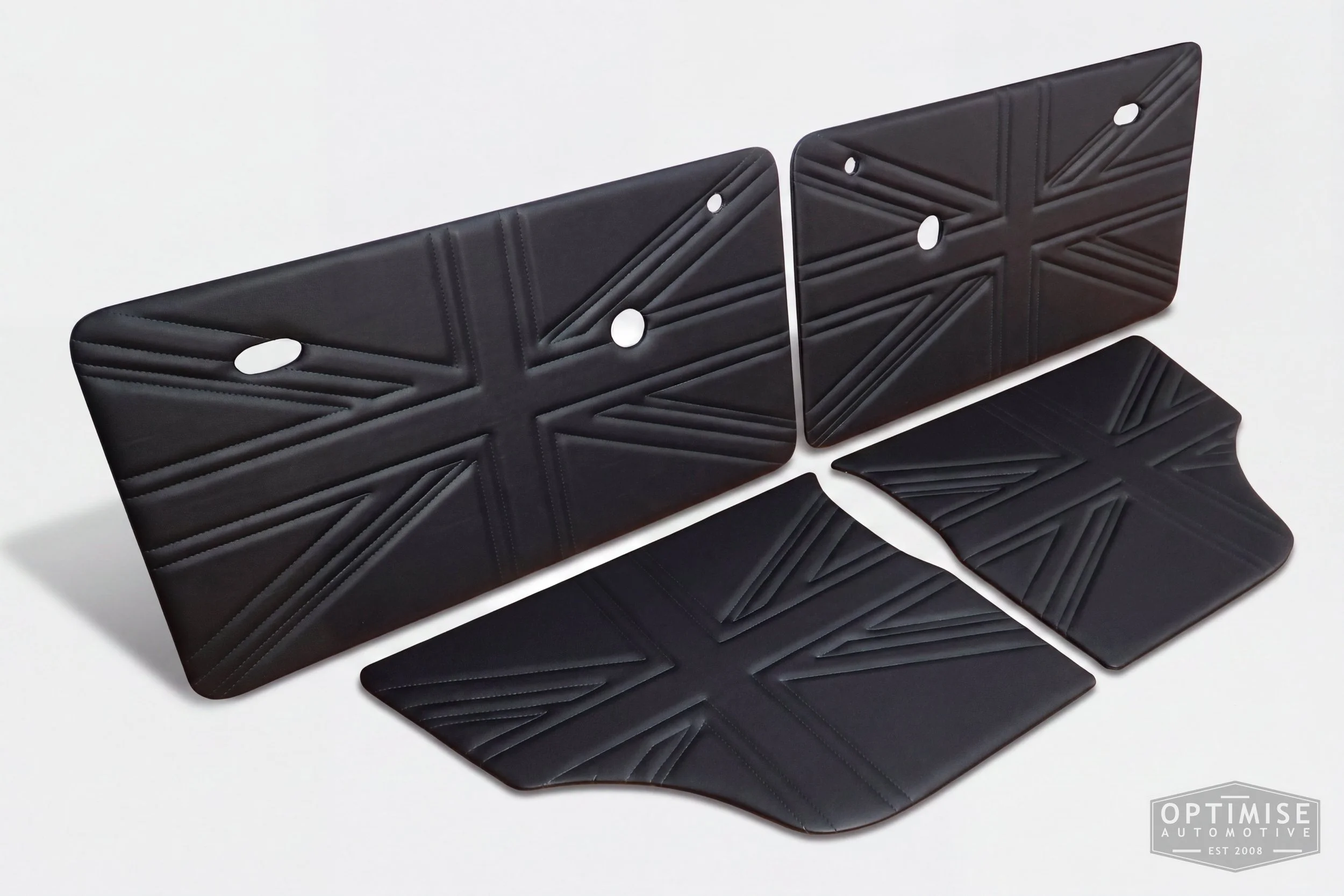 Classic Mini Union Jack door cards, trimmed in black with dark green stitching.