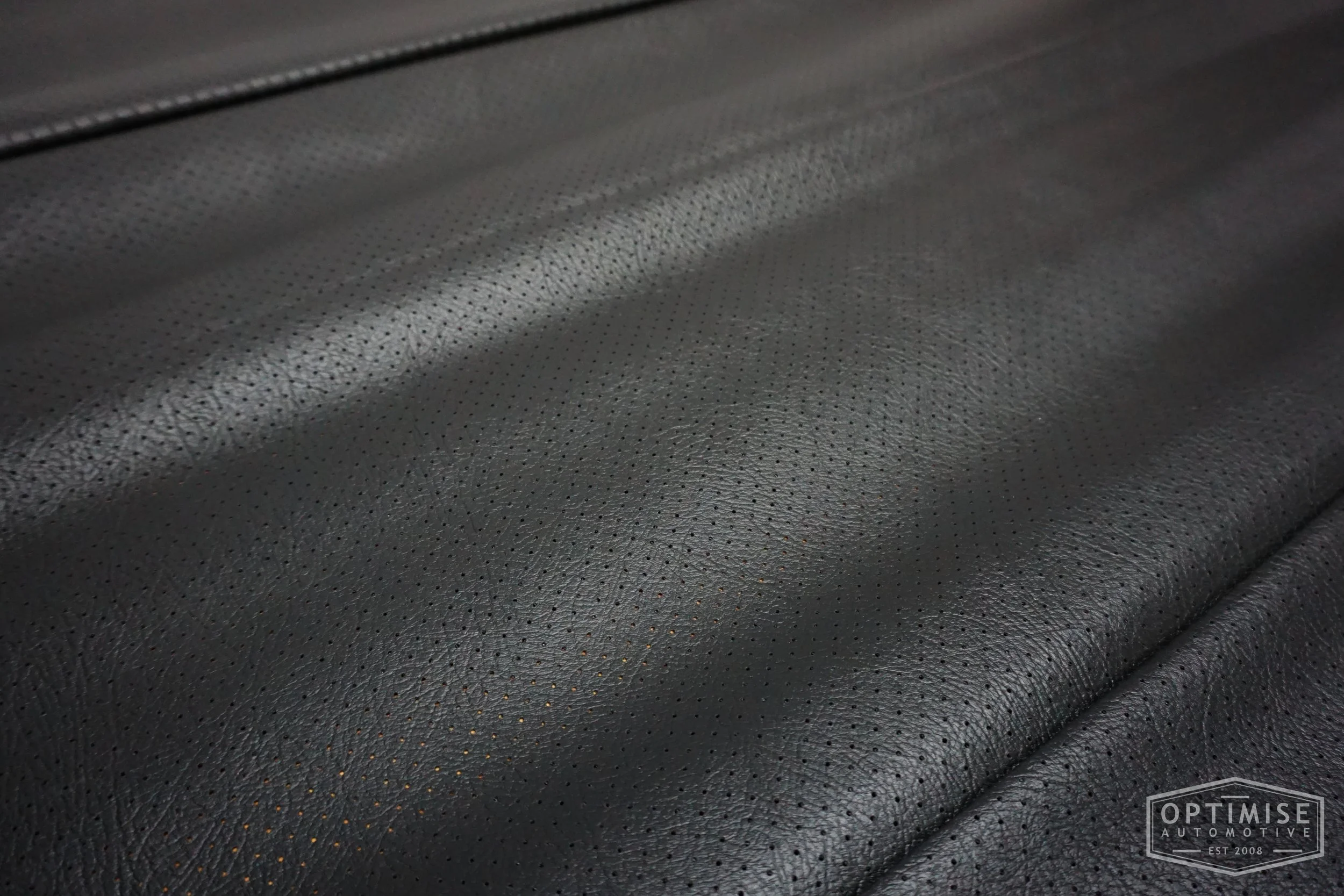 Classic Mini headlining kit, trimmed in black OEM perforated vinyl leatherette.