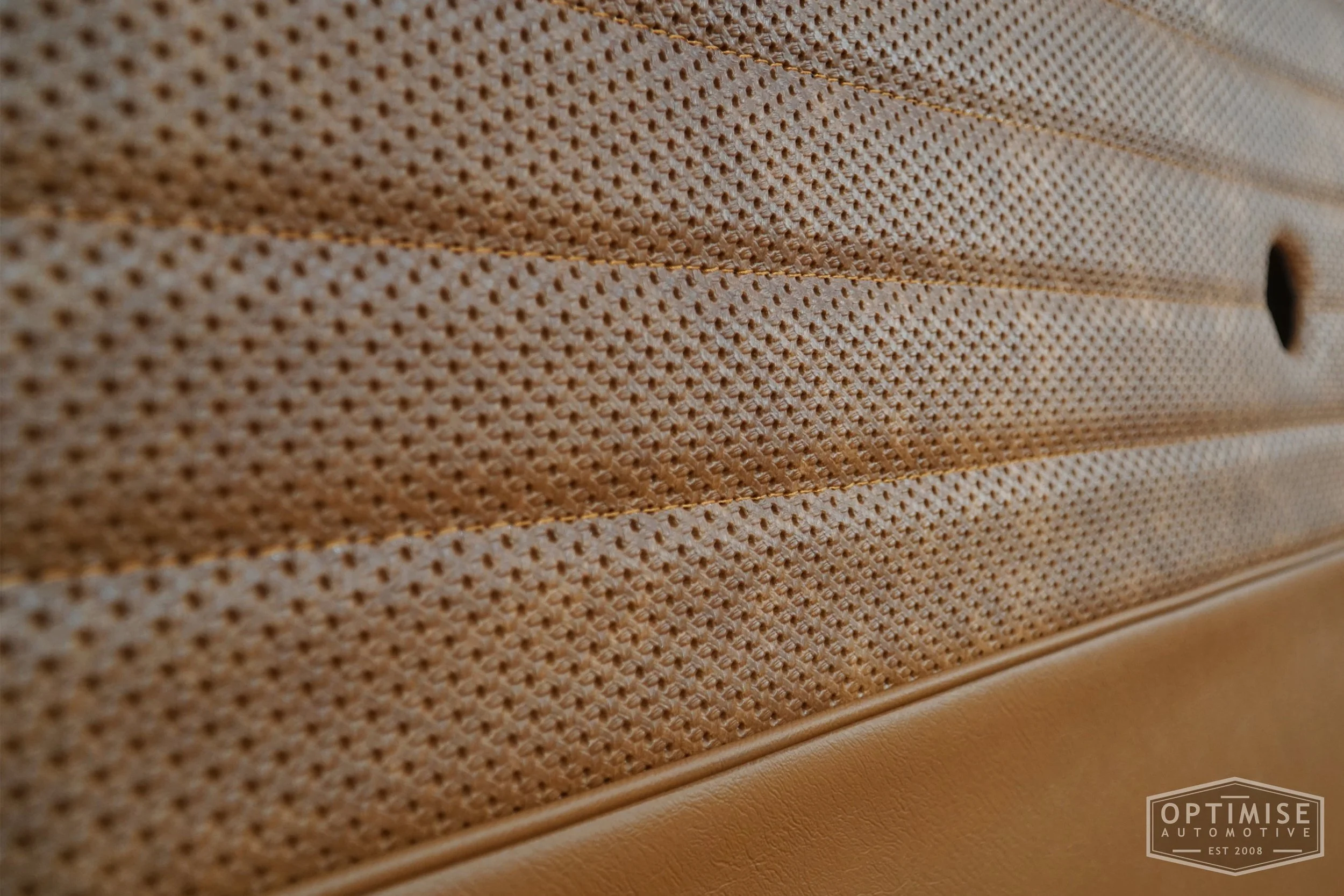 Classic Mini Monte-Carlo Plus door cards, trimmed in light brown (tan) vinyl leatherette and light brown (tan) basketweave, with light brown (tan) piping & stitching.