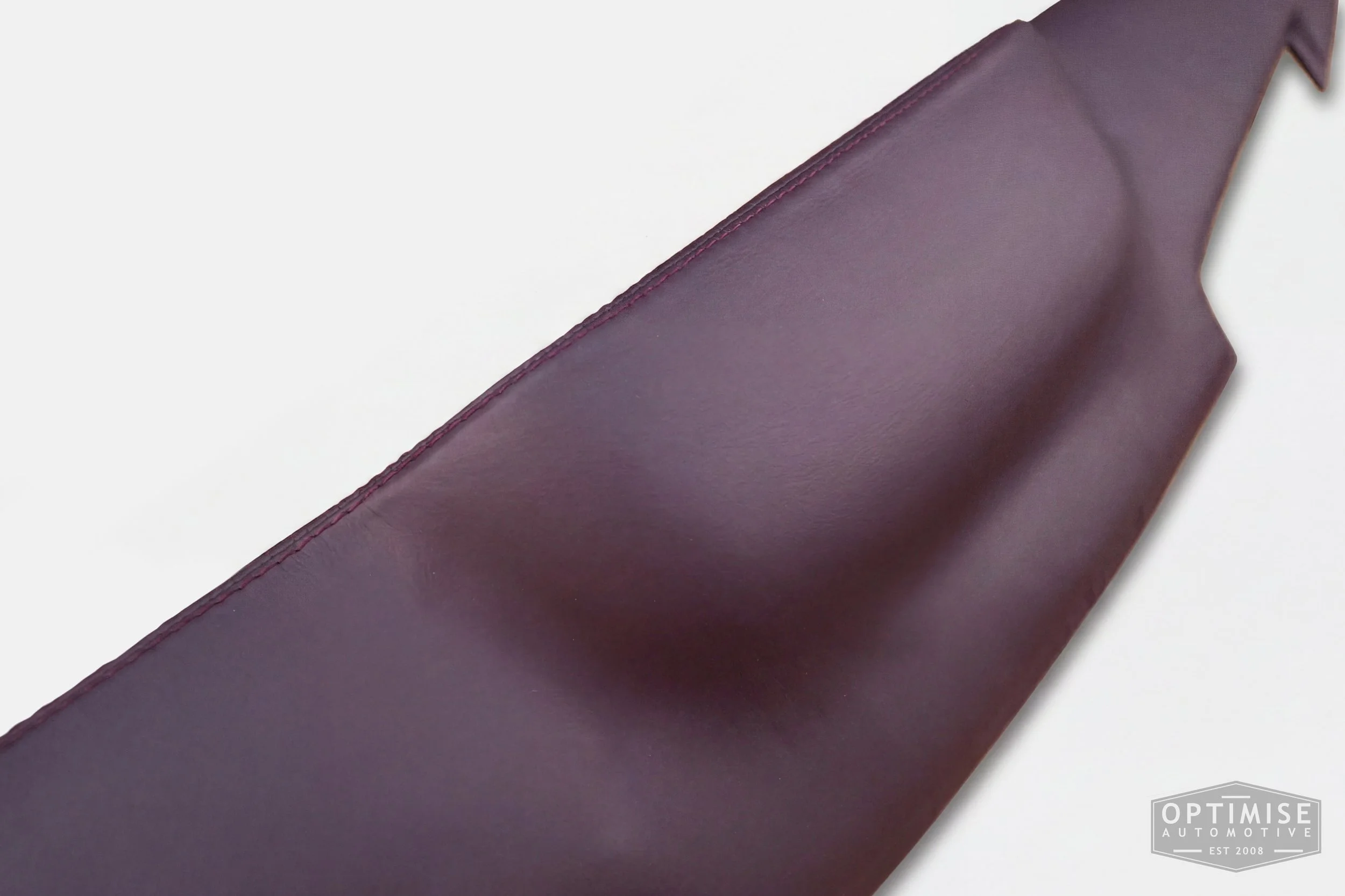 Classic Mini dash rail retrims, trimmed in Muirhead Caledonian aubergine leather.