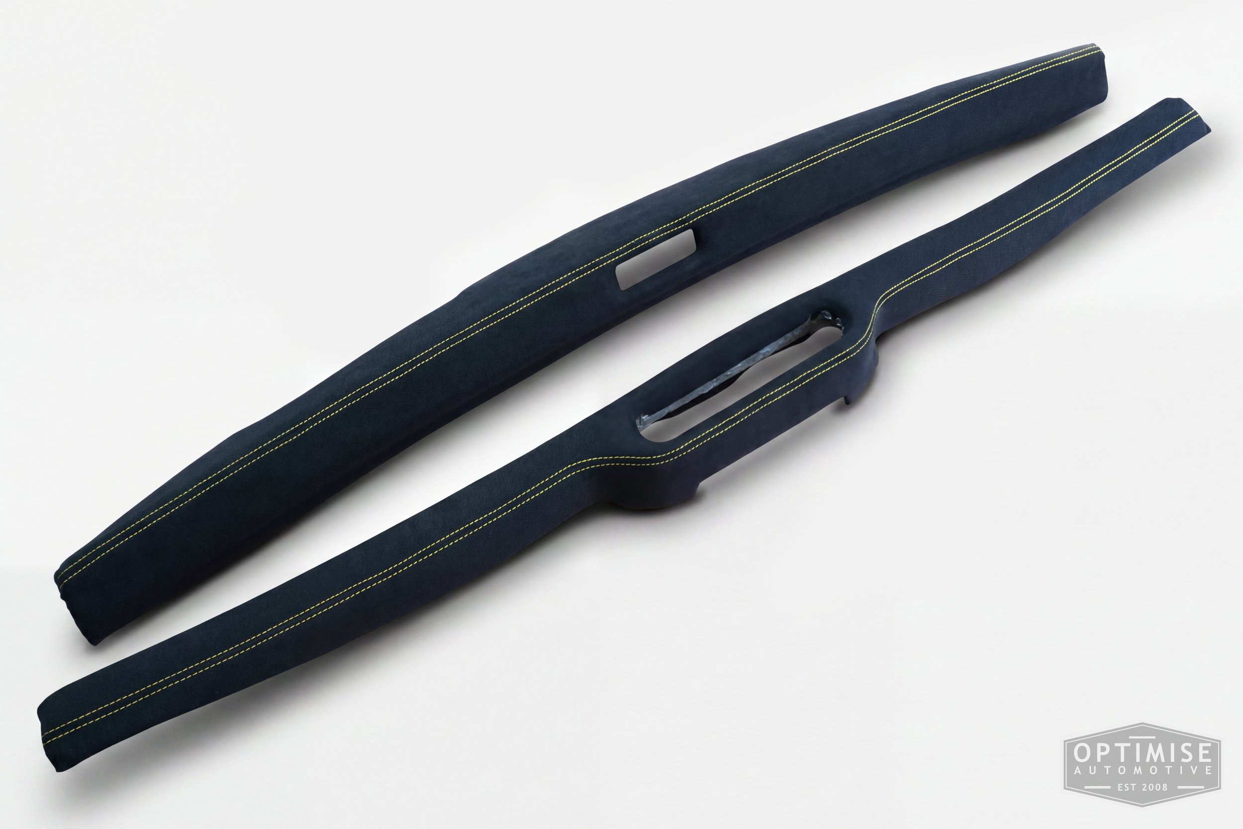 Classic Mini dash rail retrims, trimmed in black Alcantara with yellow stitching.