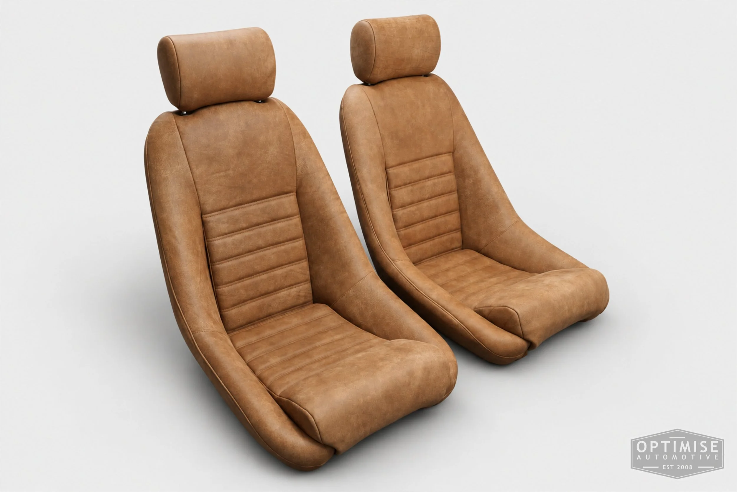 Classic Mini seat retrims featuring Cobra Classic RS front seats and a matching MK5 rear seat, trimmed in Crest Brunel walnut leather.