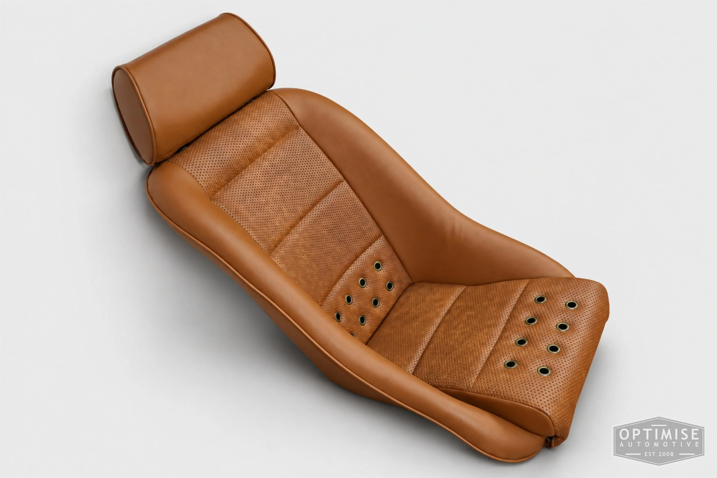 Classic Mini seat retrims featuring Cobra Classic front seats, trimmed in tan leatherette and tan basketweave  with bronze eyelets.