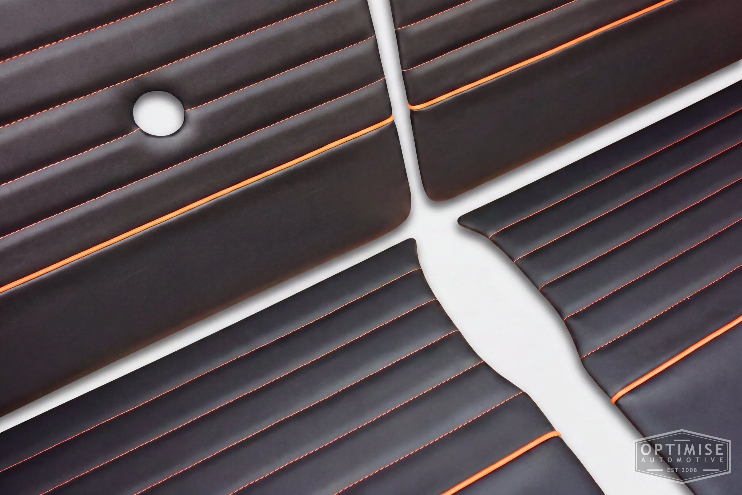 Classic Mini Monte-Carlo Plus door cards, trimmed in black vinyl leatherette with orange piping & stitching.