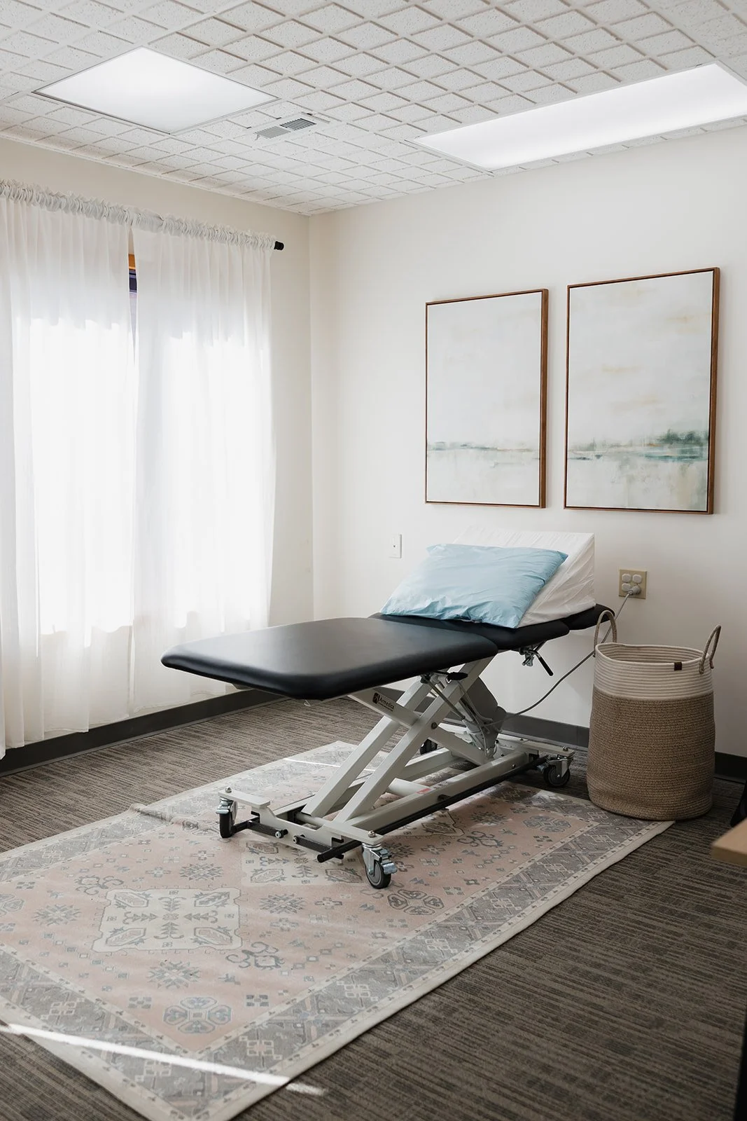Treatment room with decorations for pelvic floor and ortho PT in Columbia, MO