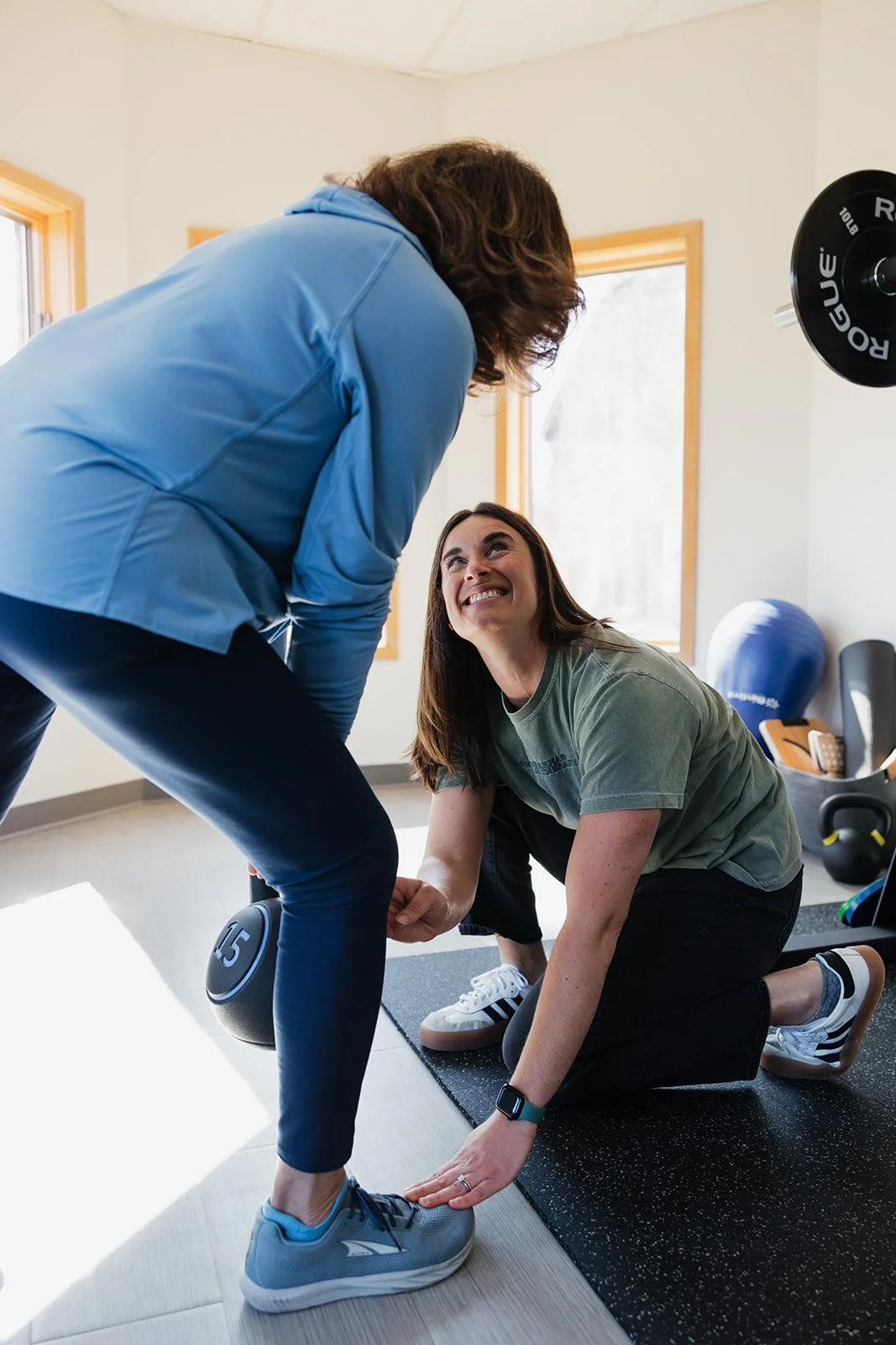 Woman exercising with pelvic health physical therapist in Columbia, MO