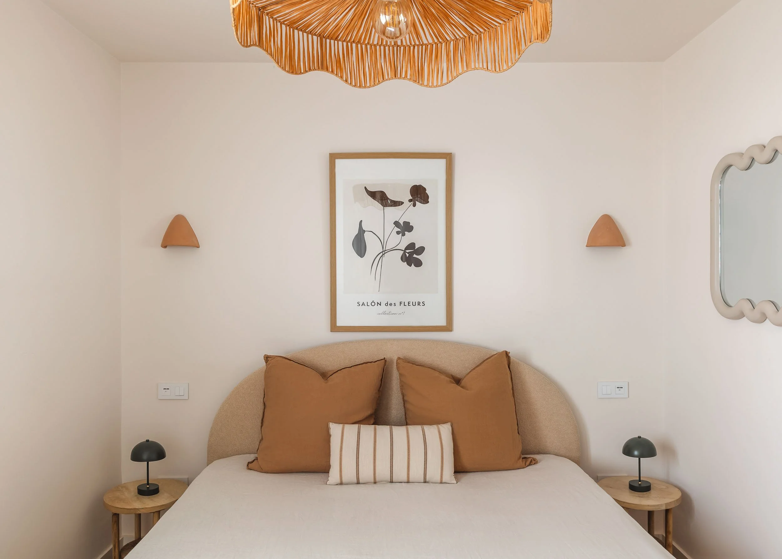 Bedroom styling with woven lighting and warm textures
