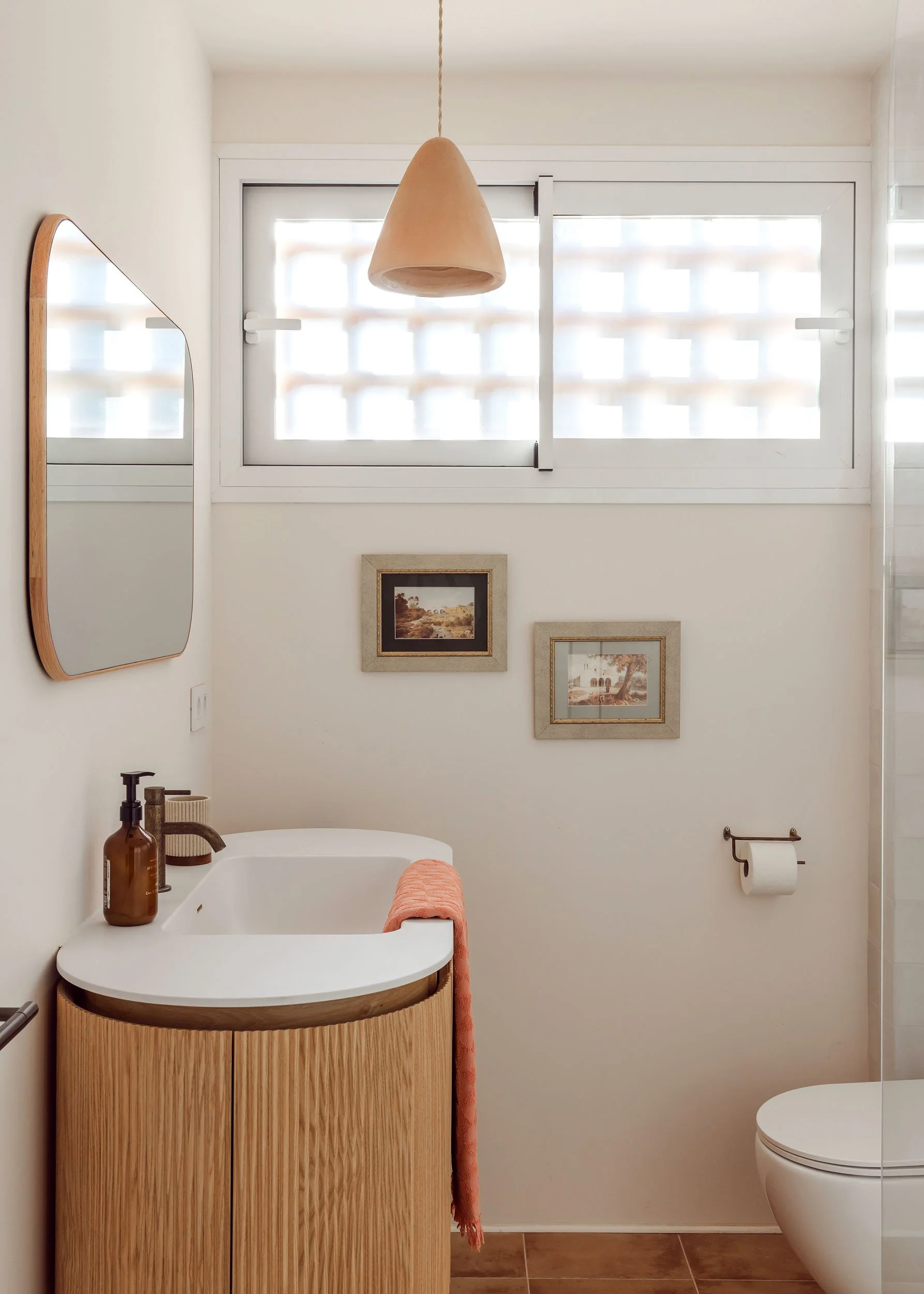 Bathroom vanity with natural materials and vintage accents