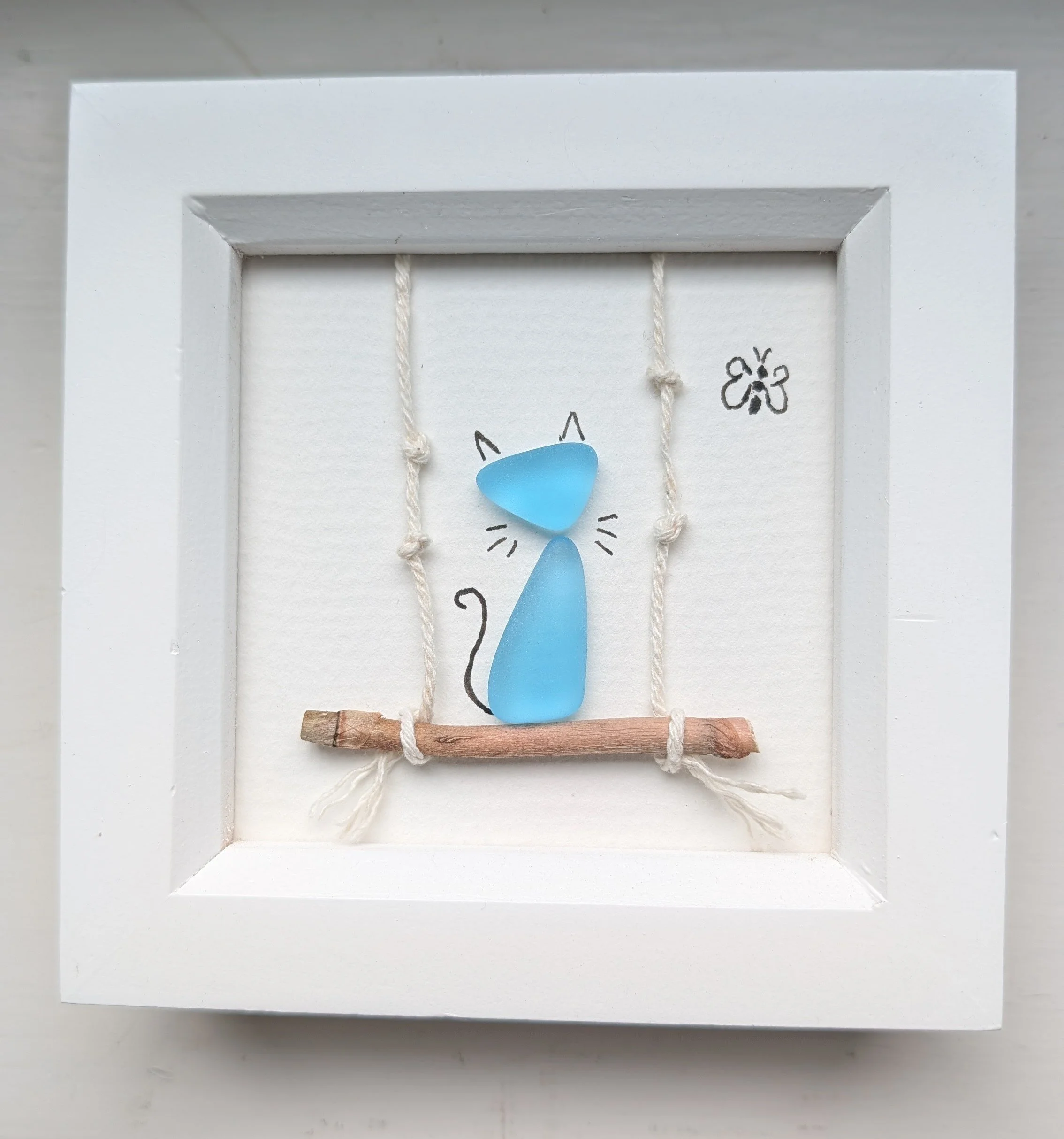 cat on swing picture, £10