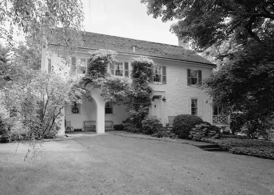 Stone house with double arch entry
