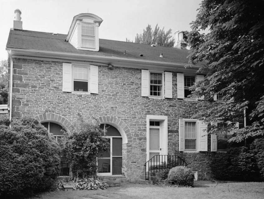 Stone farmhouse with arches