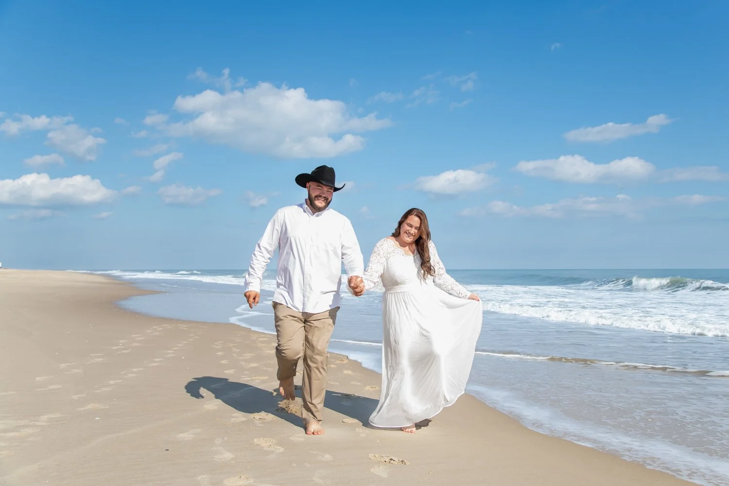 Wedding and anniversary couples photo sessions on the beach in Ocean City, MD by Rayne Photography