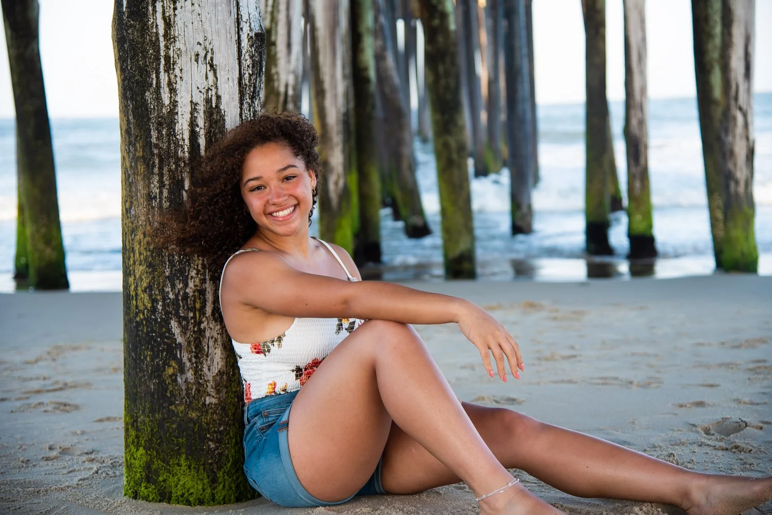 Sea-side senior portraits in Ocean City at the Inlet Boardwalk by Rayne Photography 