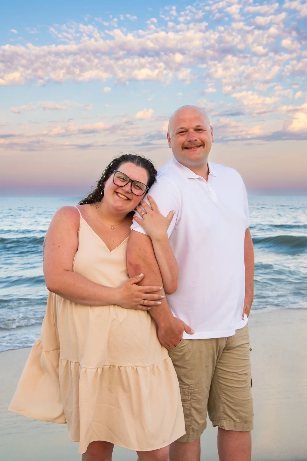 Sunset engagement photo sessions on the beach in Ocean City by Rayne Photography