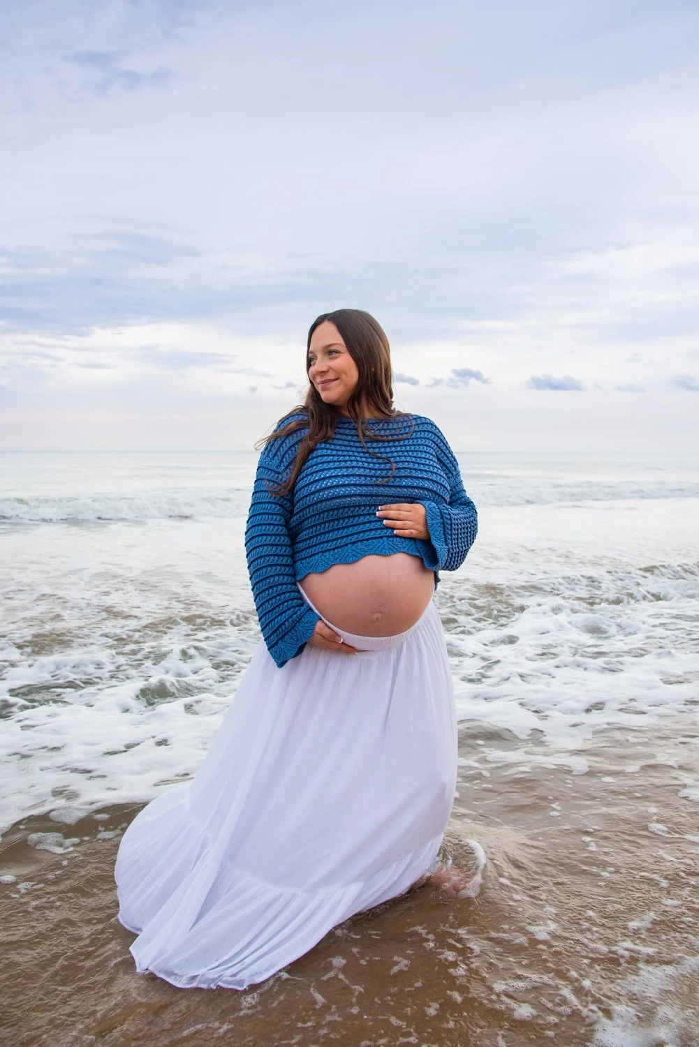 Sea-side maternity photo session by Rayne Photography in Ocean City, MD