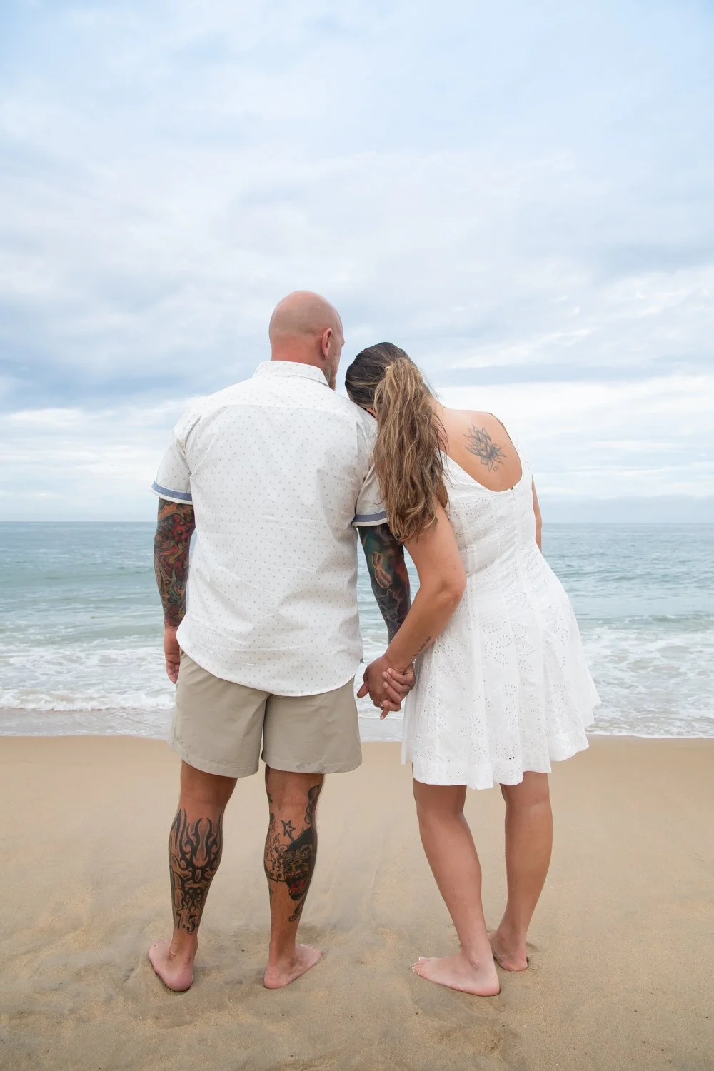 Engagement photography session on the beach at Bethany Beach, DE by Rayne Photography