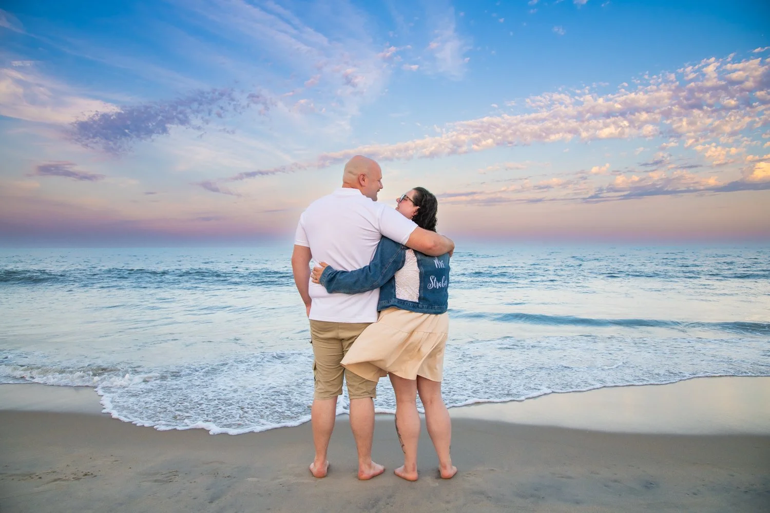 Sunset engagement photo sessions on the beach in Ocean City by Rayne Photography