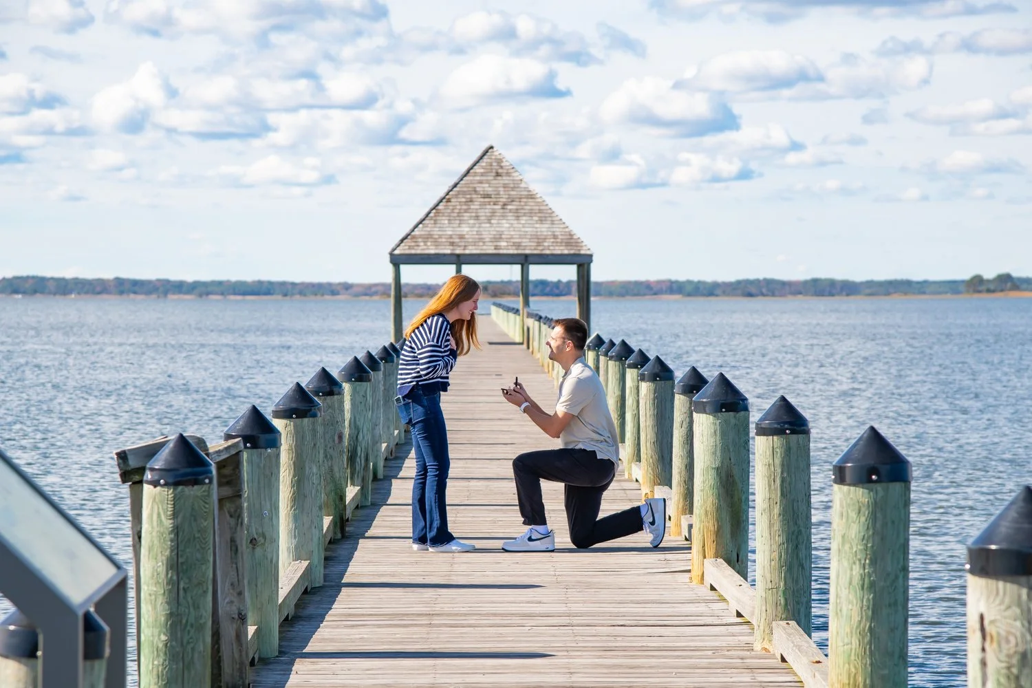 Surprise engagement session on the pier at Northside Park in Ocean City, MD by Rayne Photography
