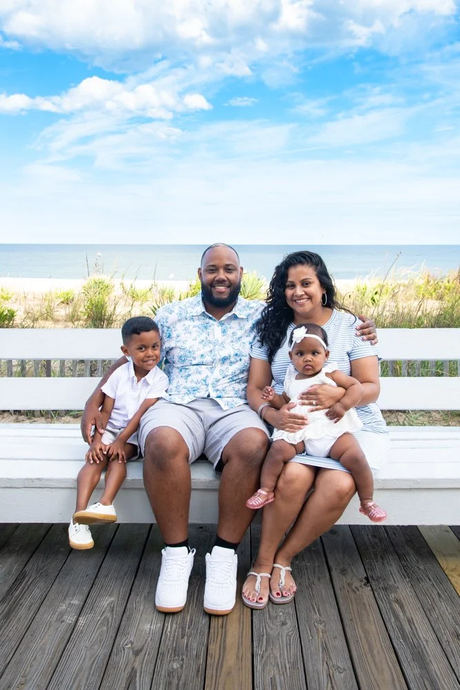 Family photos on the boardwalk in Rehoboth Beach, DE