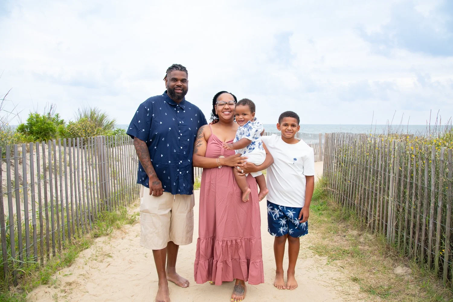 Family portraits by the dunes in Ocean City, MD