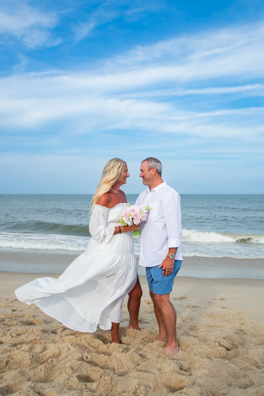 Elopement and wedding photography sessions on the beach in Ocean City, MD by Rayne Photography