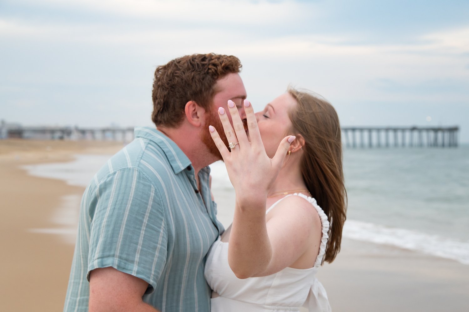 Engagement session on the beach at the Ocean City Inlet and Boardwalk by Rayne Photography