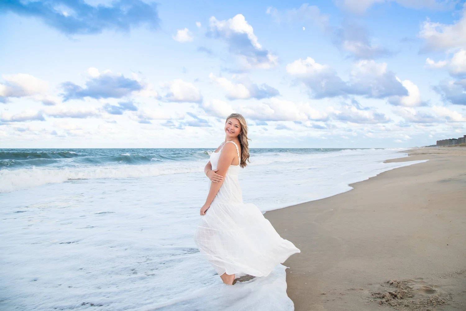 Senior portrait photo session on the Beach during golden hour with Rayne Photography