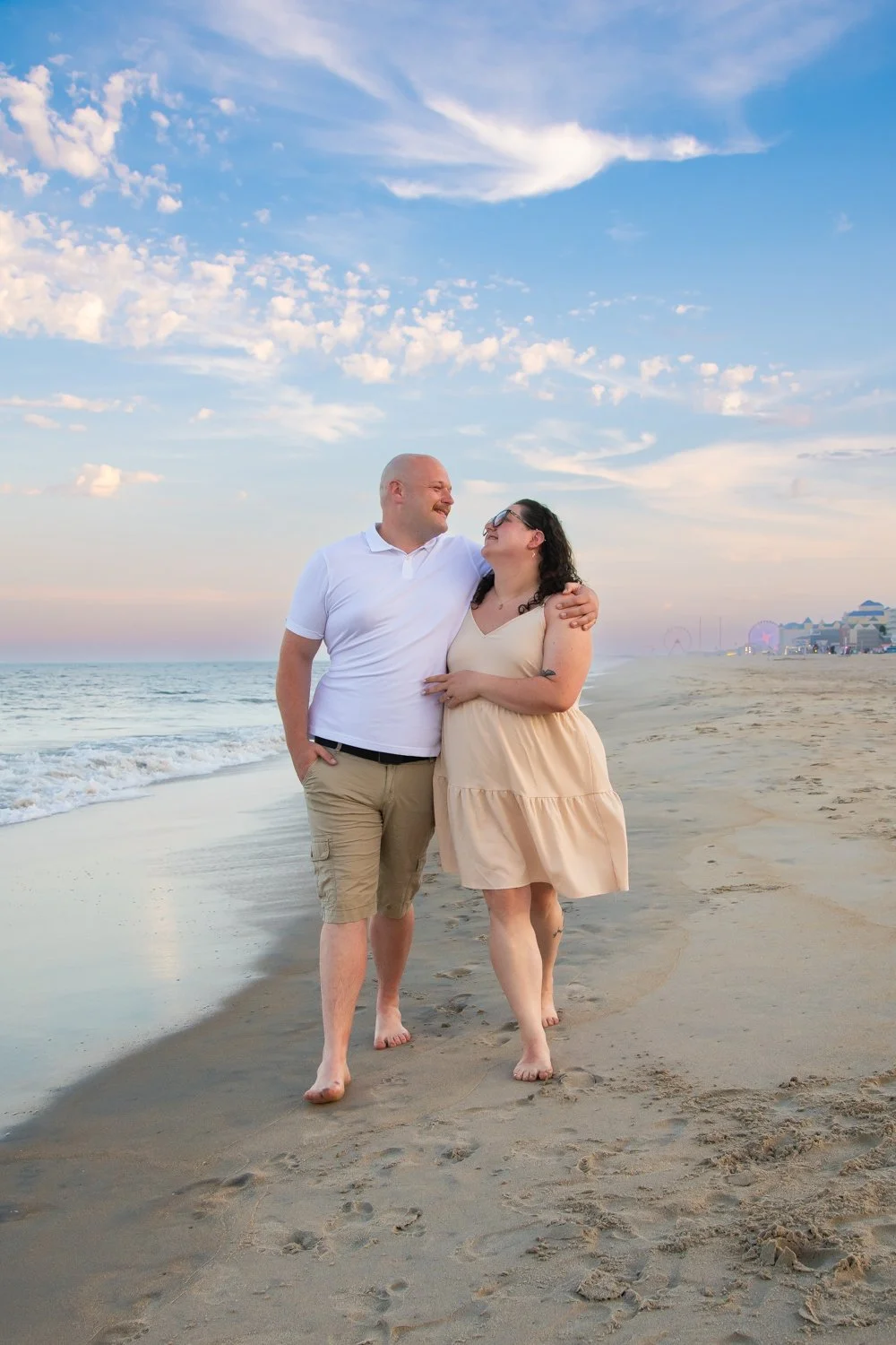 Sunset engagement photo sessions on the beach at the Ocean City Inlet and Boardwalk by Rayne Photography