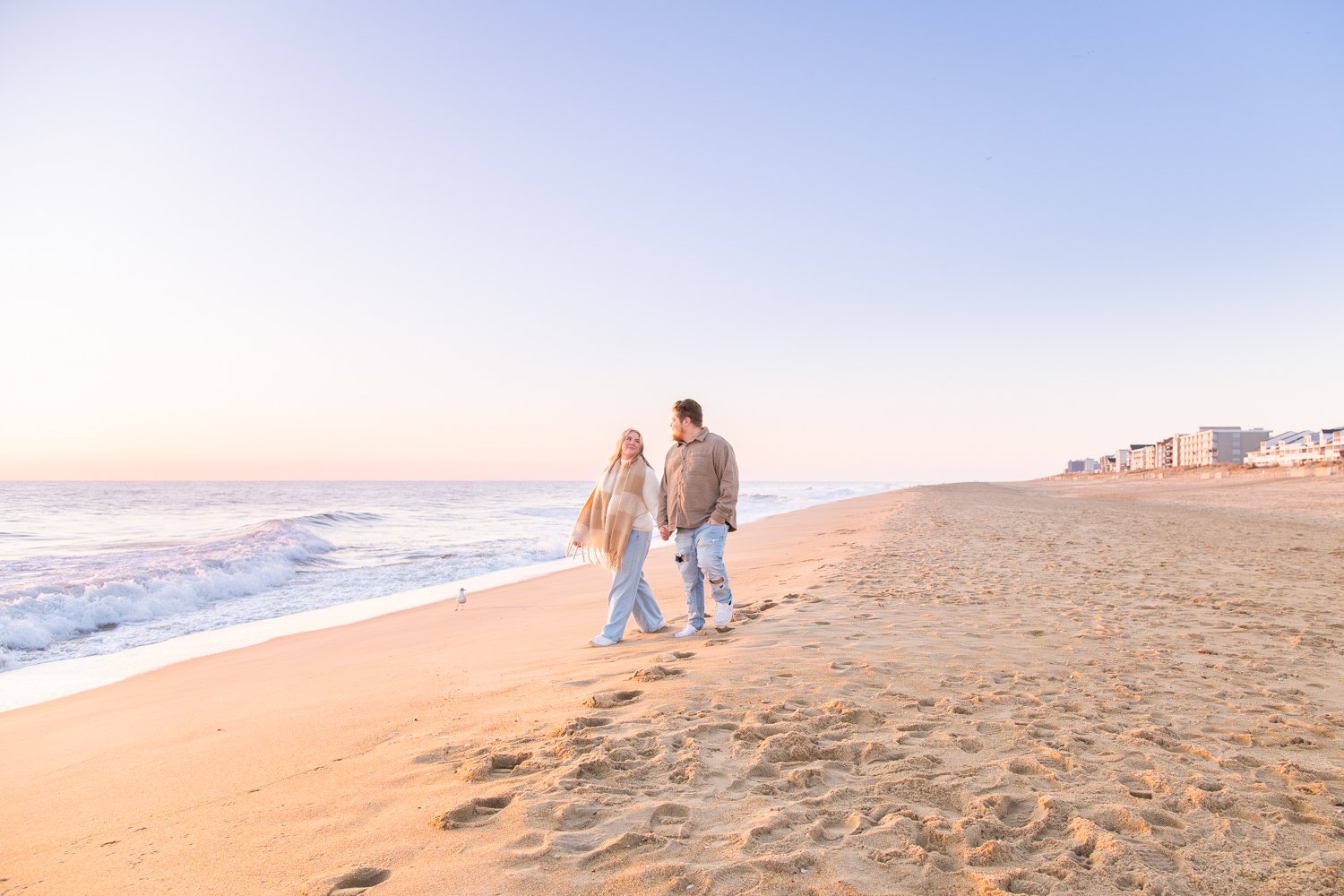 Sunrise engagement and couples engagement session in Ocean City MD by Rayne Photography