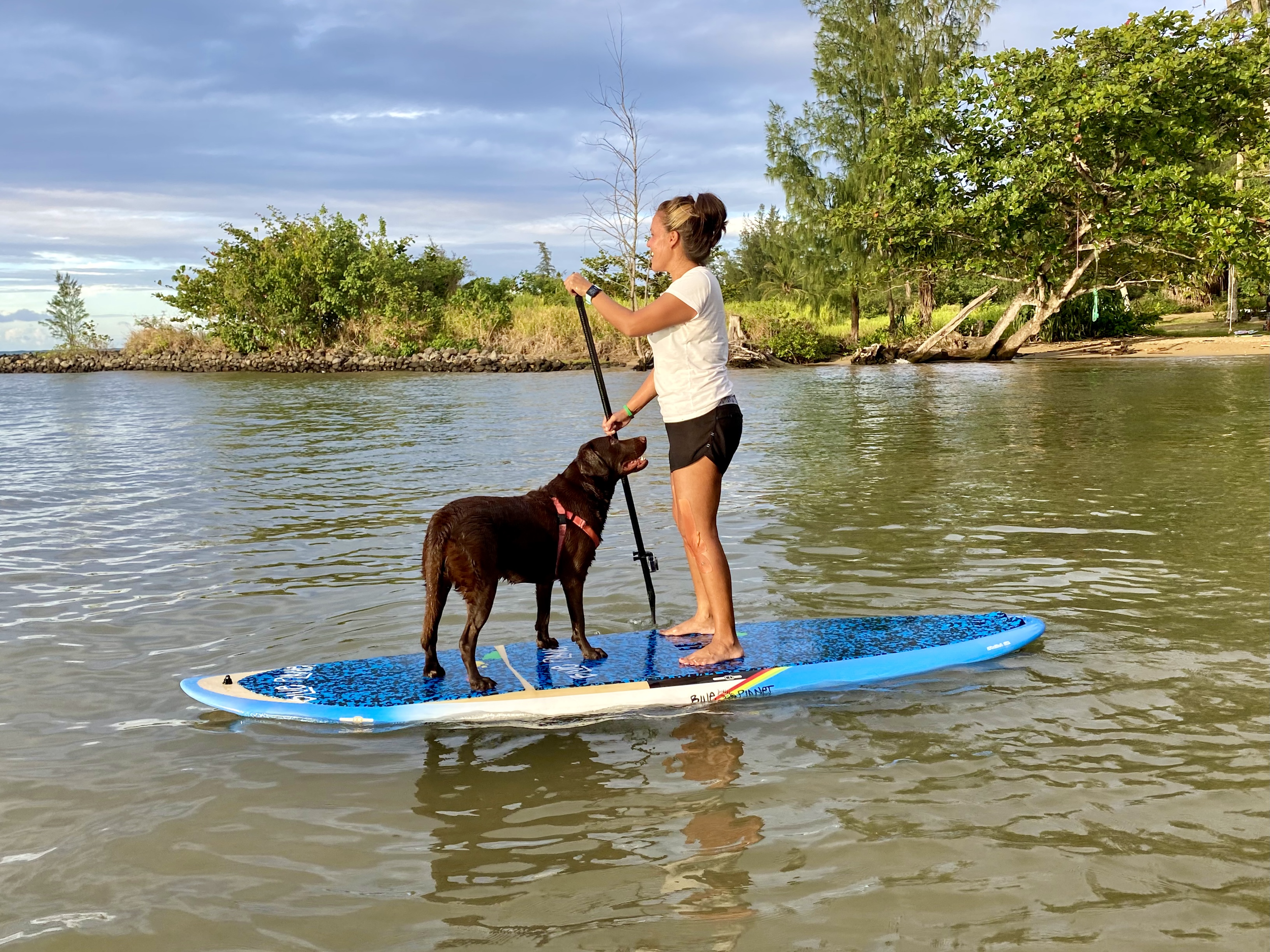 Ziva loves to standup paddleboard (SUP)