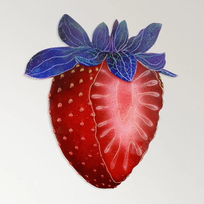 Photo of the artwork, representing a strawberry with part of it sliced off to reveal the pattern inside.