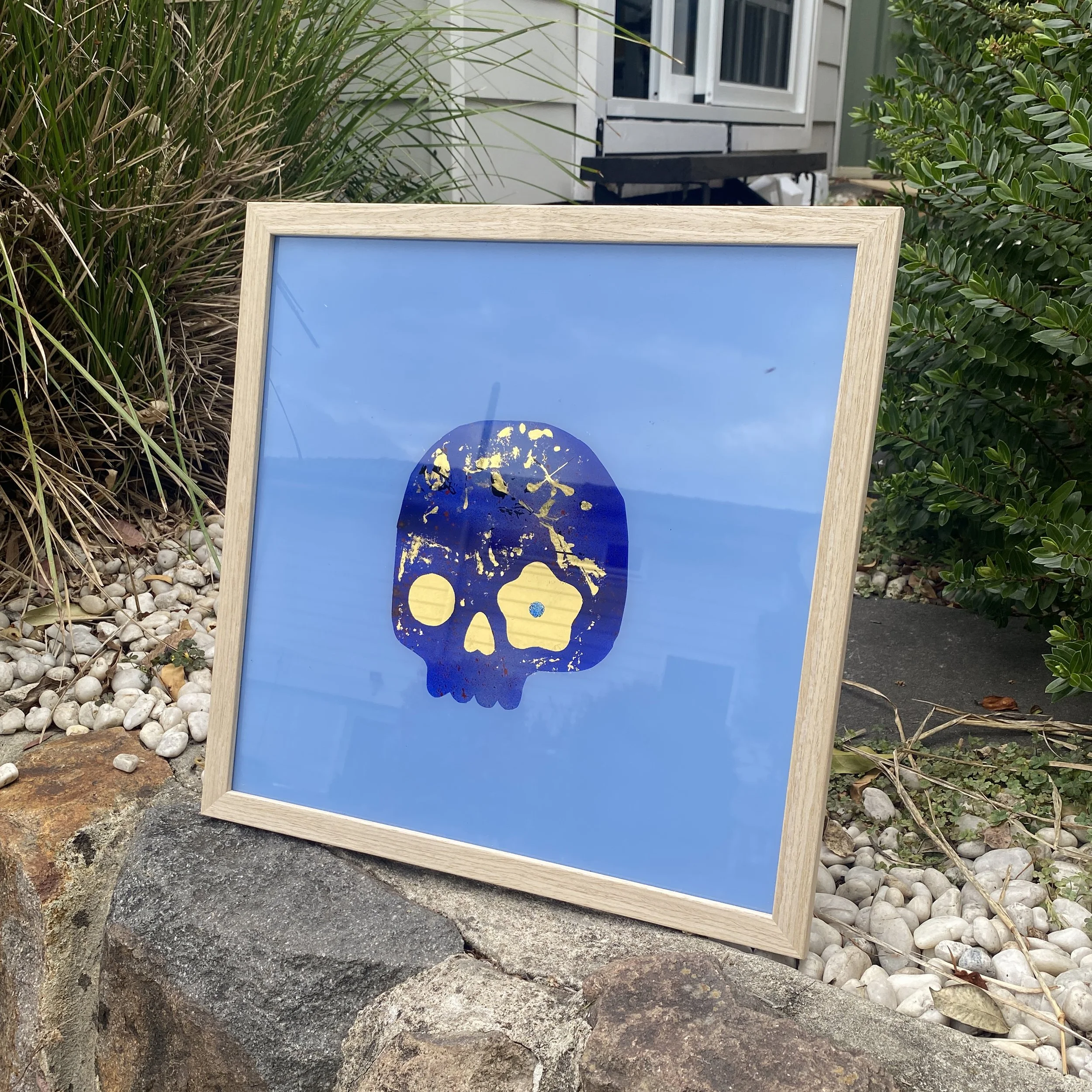photo of framed flower skull artwork