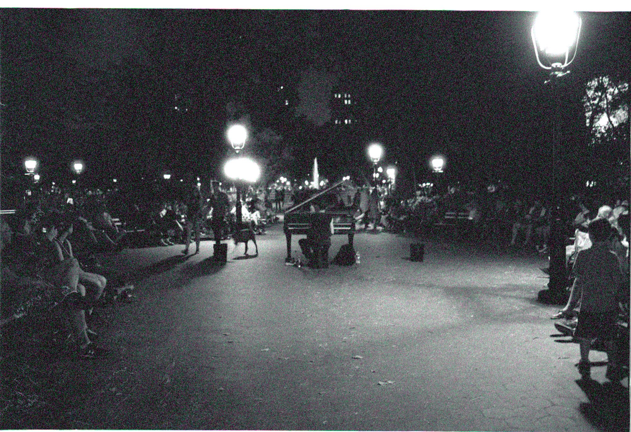 ennis 35mm film photography -washington square park chopin grand piano concert at night black and white-01.jpg
