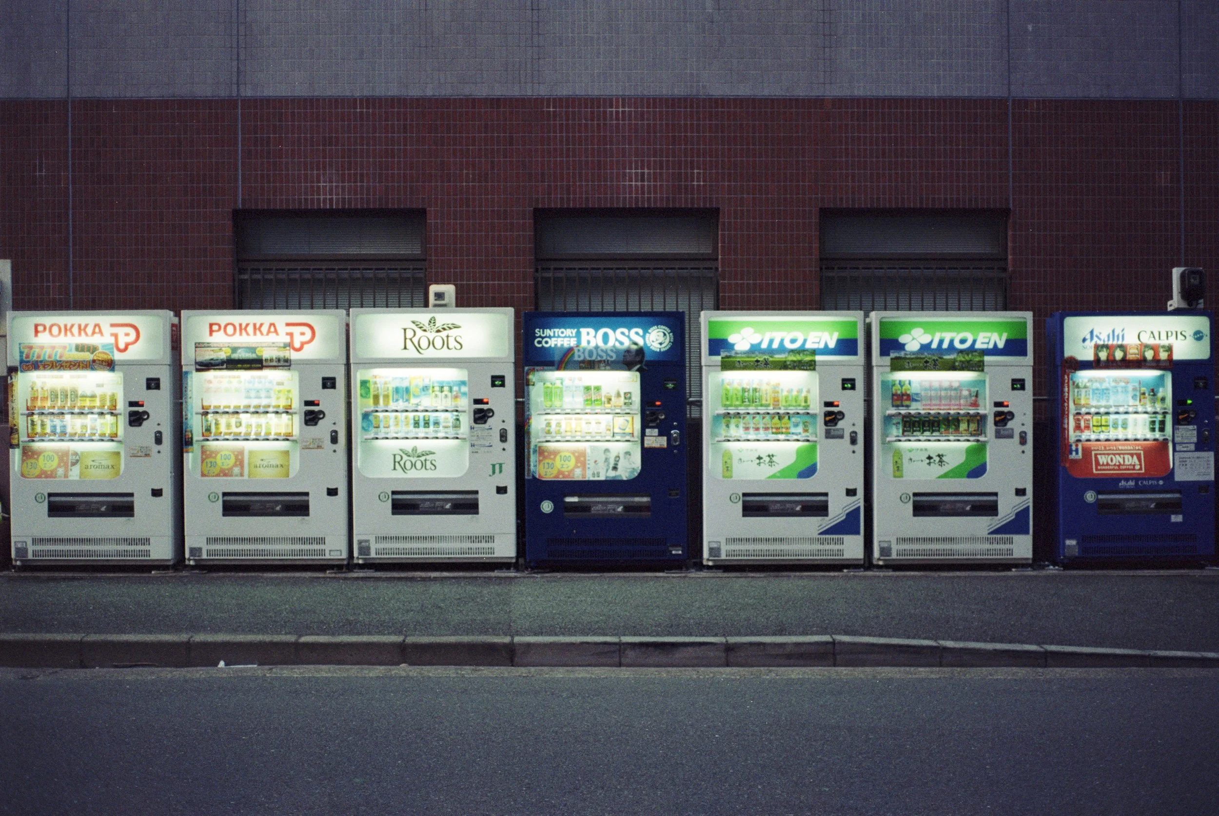 line of vending machines on street * ennis 35mm film photography japan street 2012
