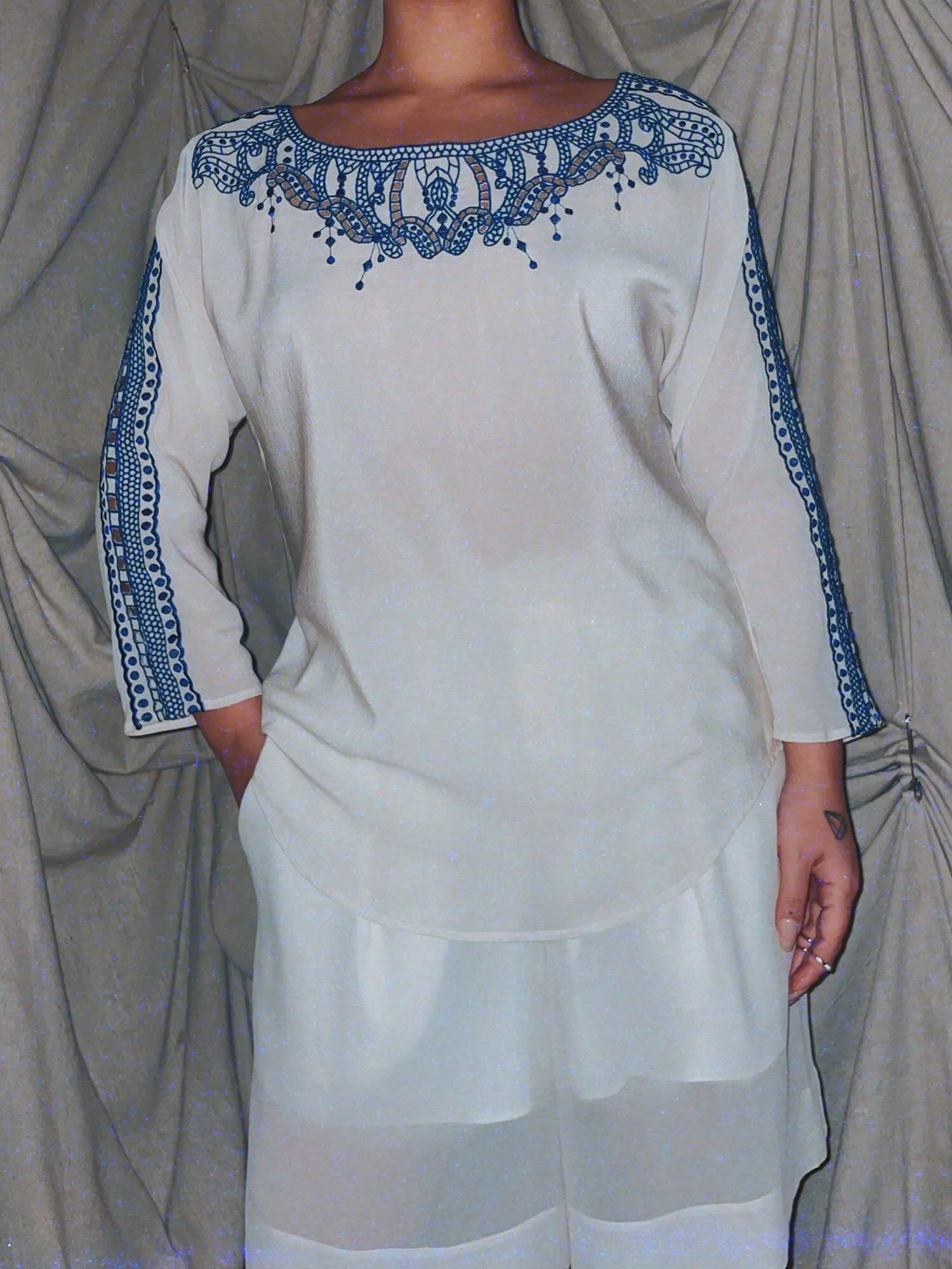 1 Waking Up in Greece - 3/4 sleeve white silk shirt with blue embroidered embellishments shoulders - ennis process artist ego death estate sale fashion style consignment thrifting.jpg
