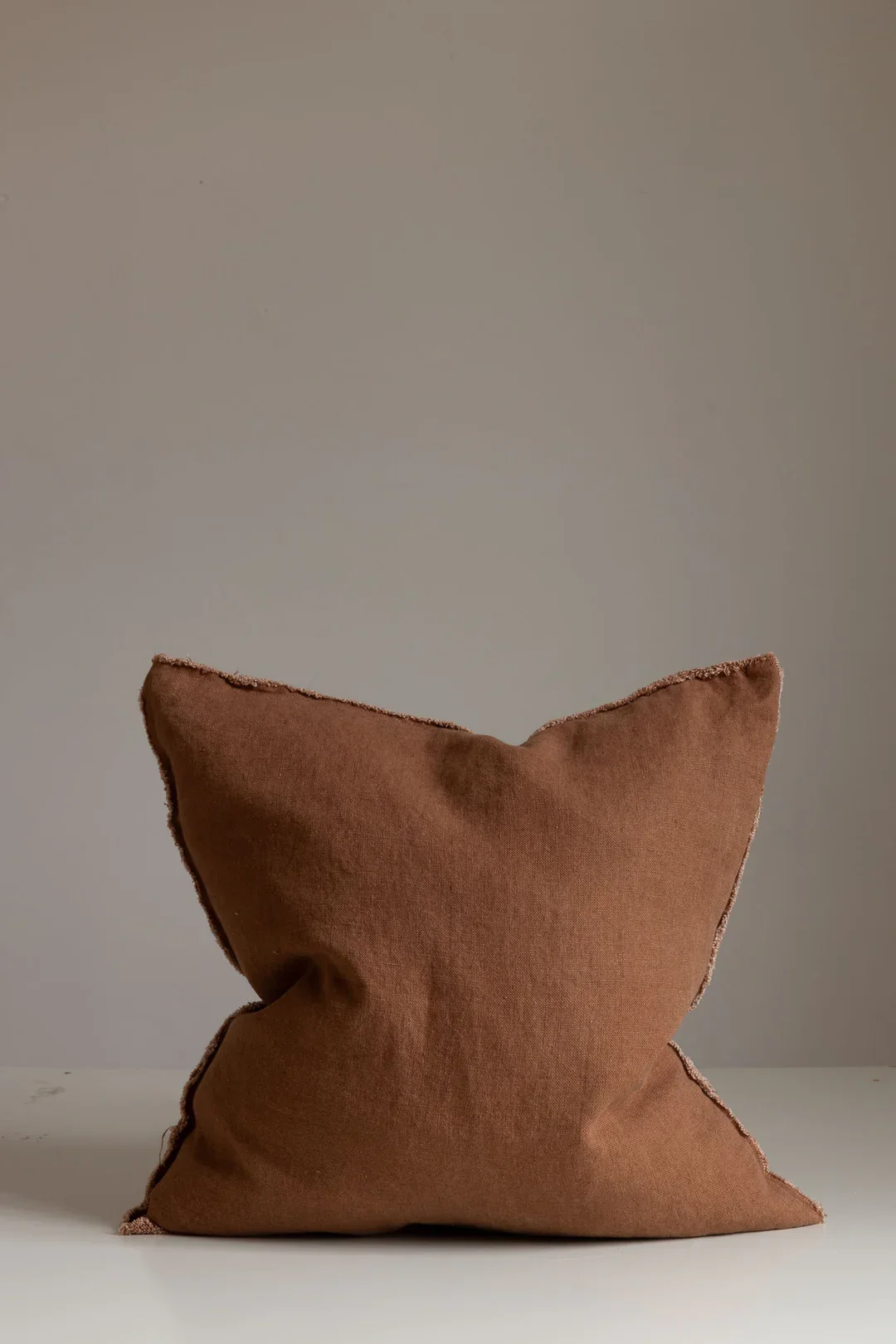 lee cushion rust2.webp