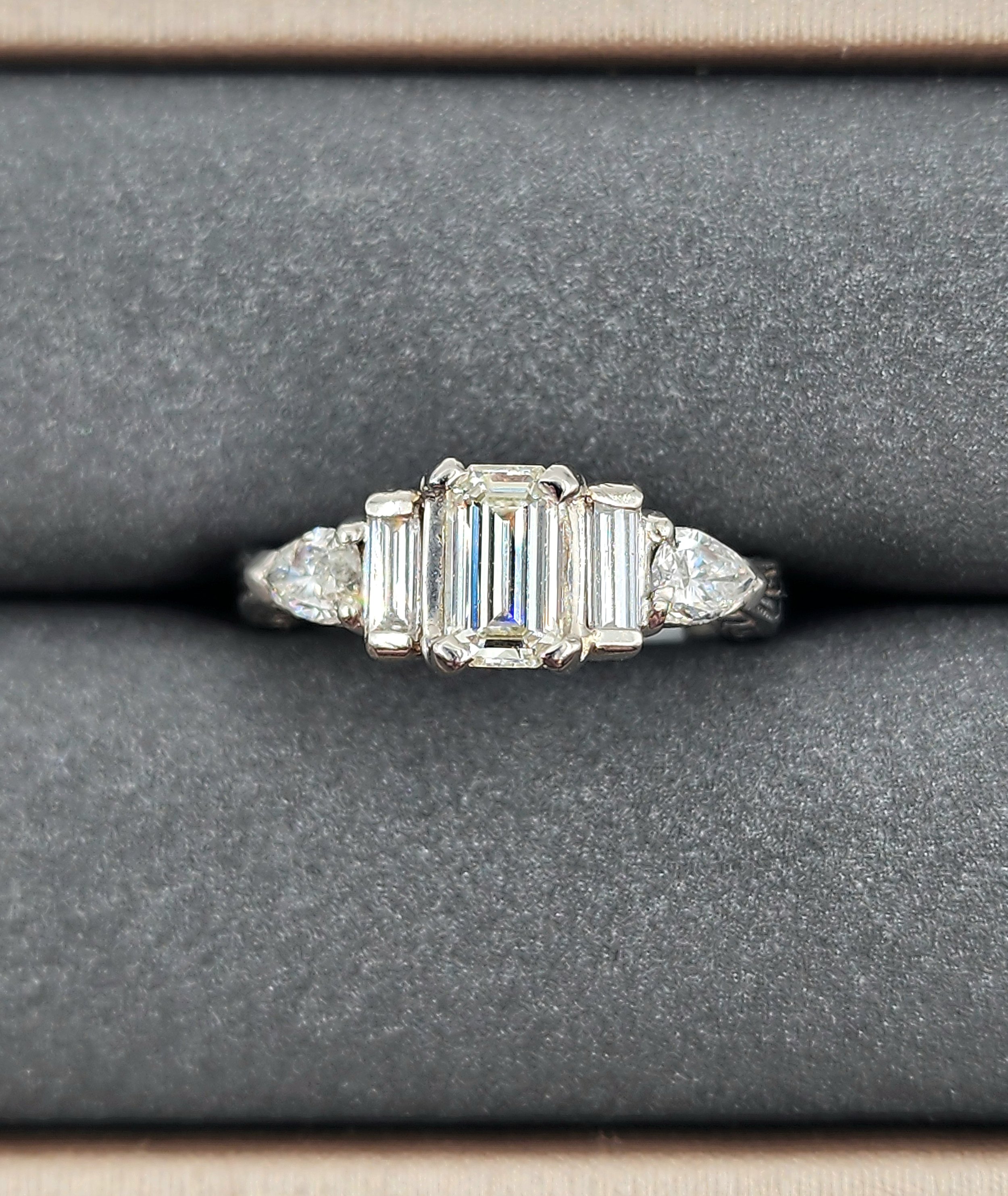 1.25 ct Platinum Three-Emerald Diamond Ring