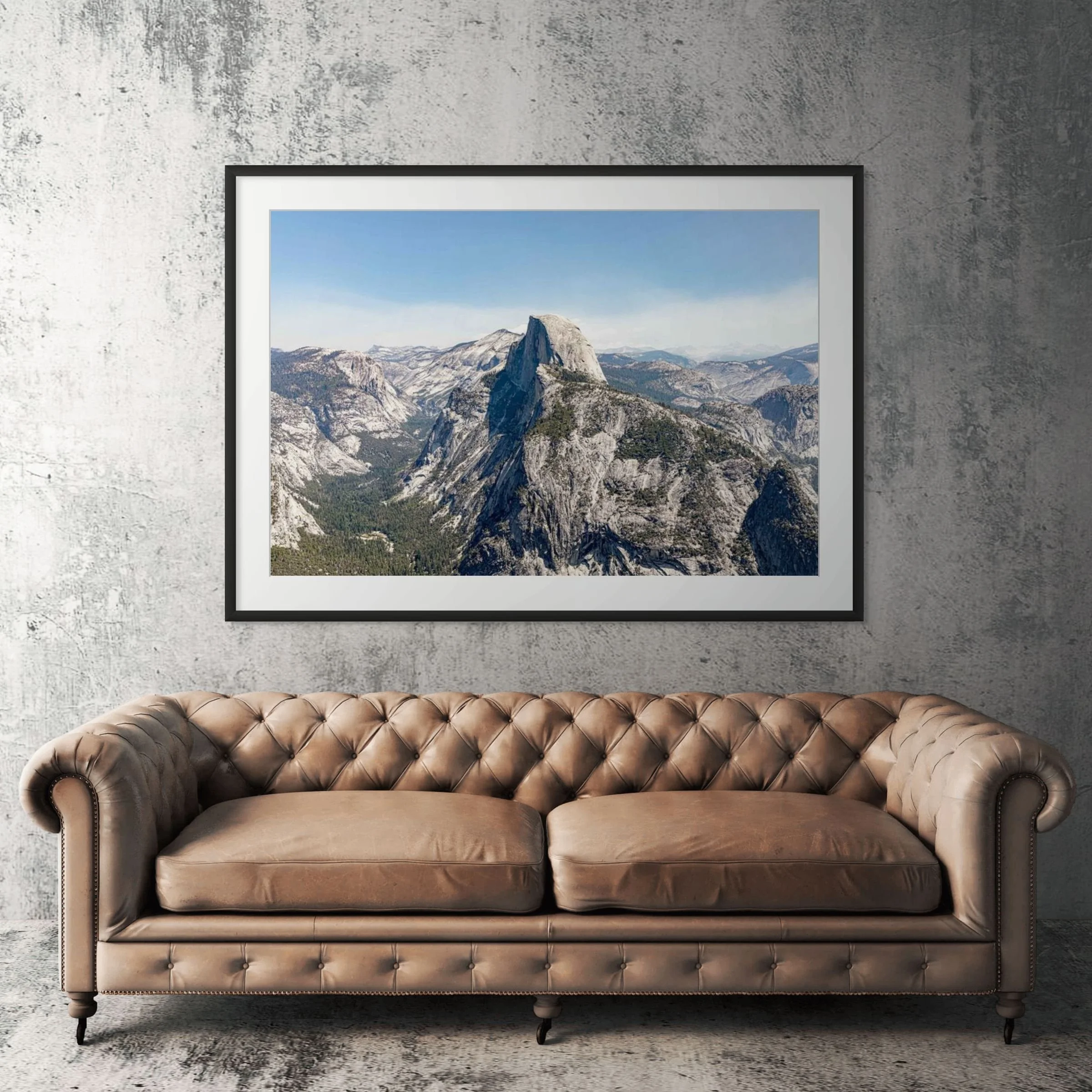 Yosemite Glacier Point alternate view framed print displayed above tan leather sofa in living room