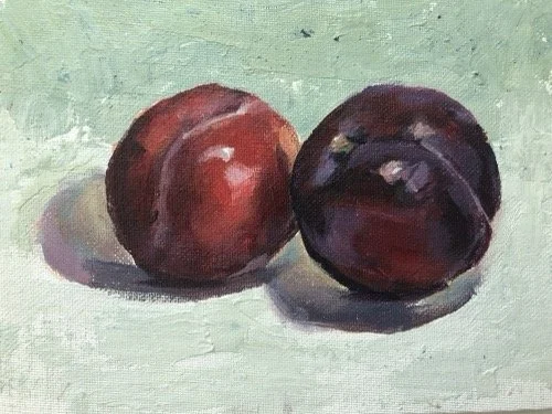 A painting of two plums on a light green surface with shadows.