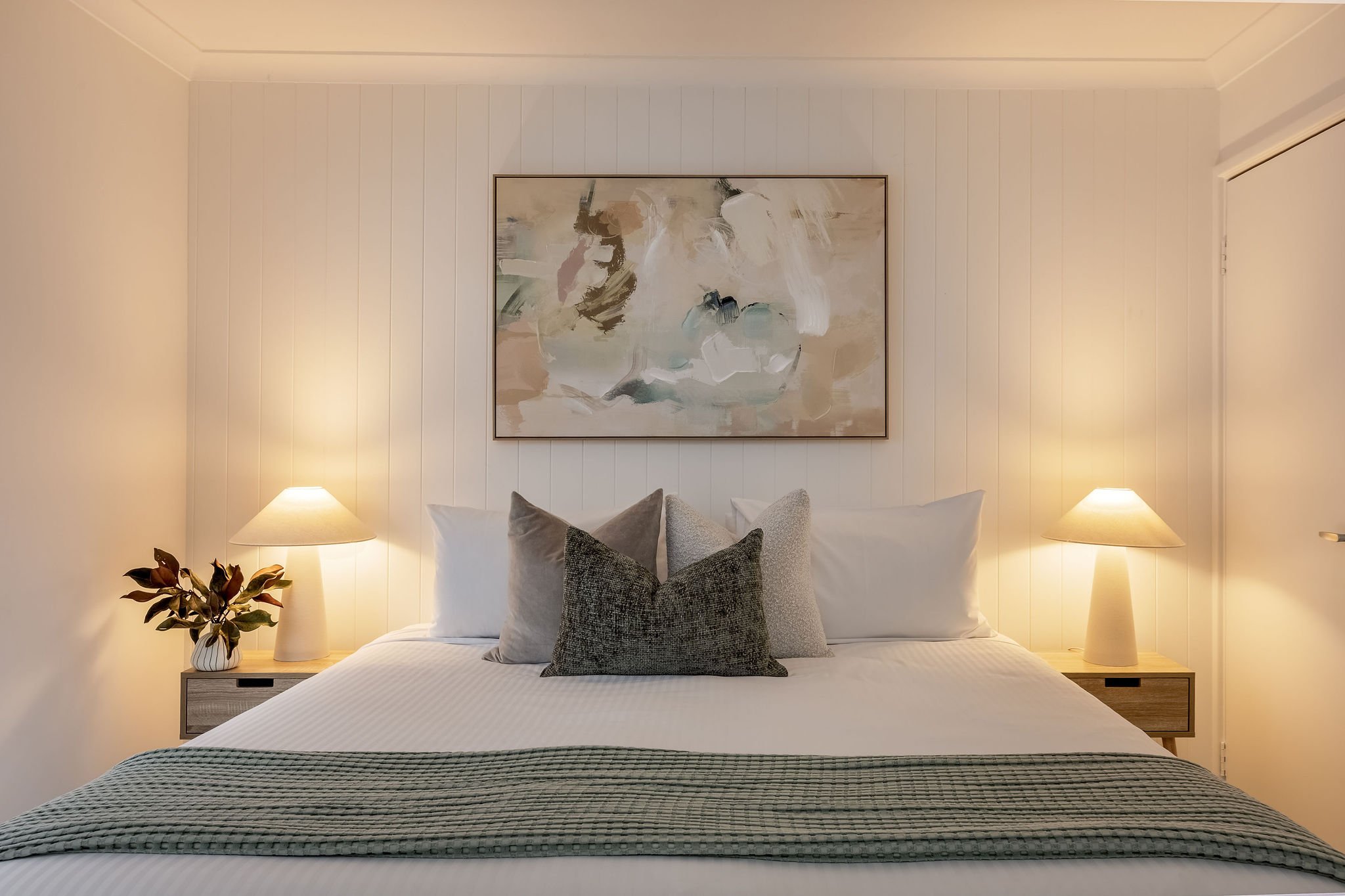 Bedroom Three Queen bed styled in soft sage and linen, Seastream Haven DunsboroughBedroom Two: Queen bed