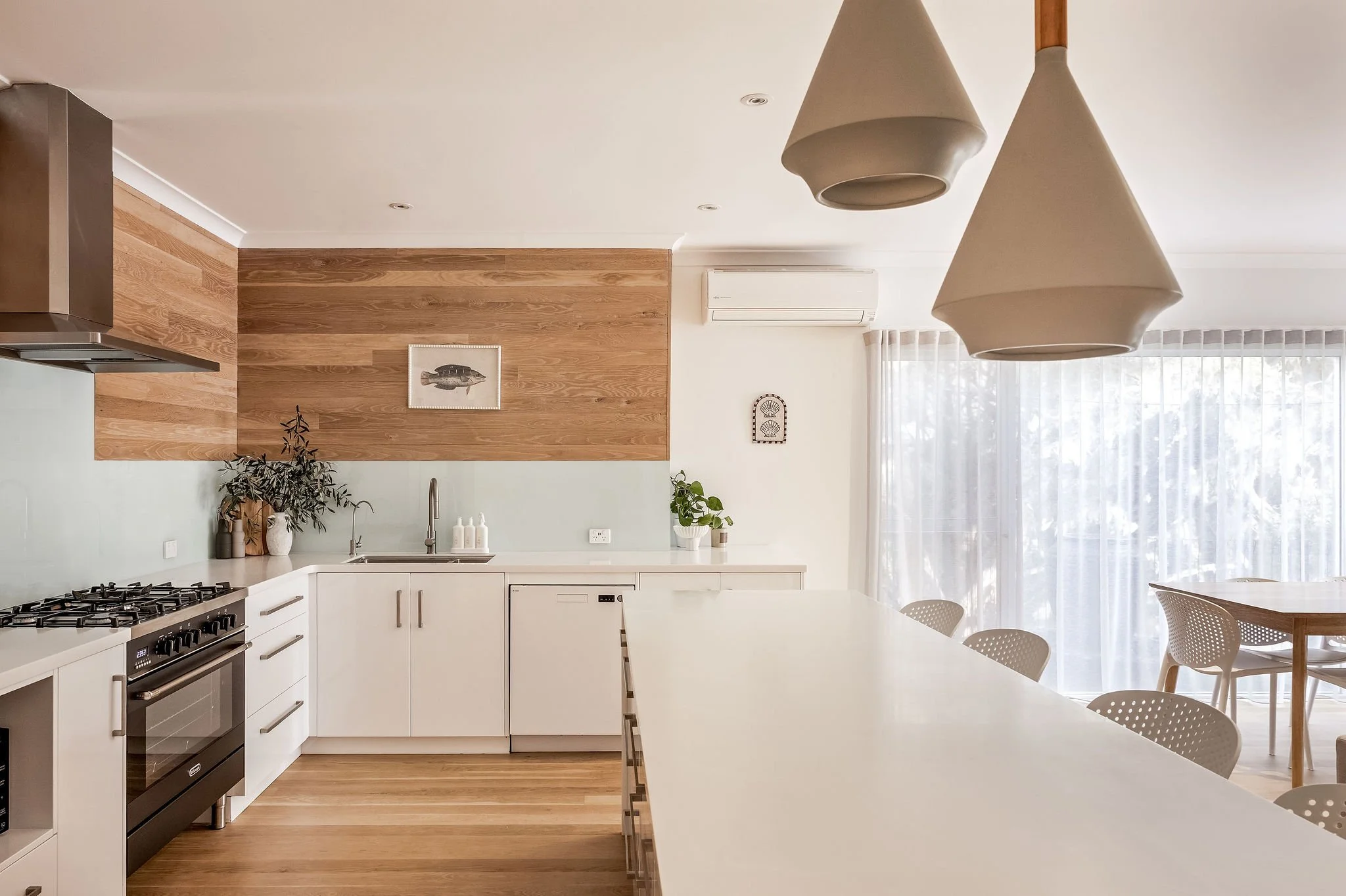 Timber and white kitchen with 900mm oven and pendant lighting, Seastream Haven Dunsborough