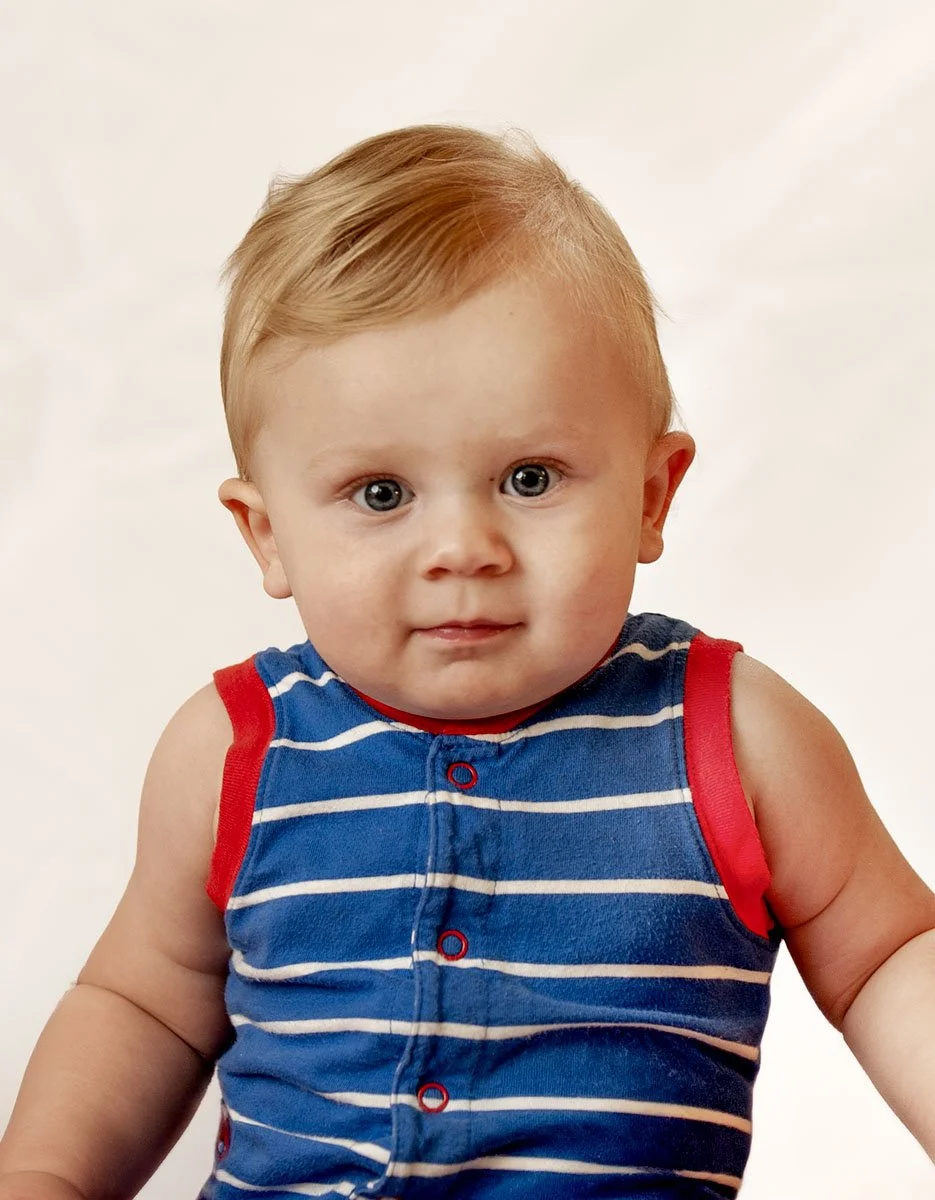 Baby passport photos Los Angeles — older infant sitting up for a passport-style portrait, Karen Vaisman Photography