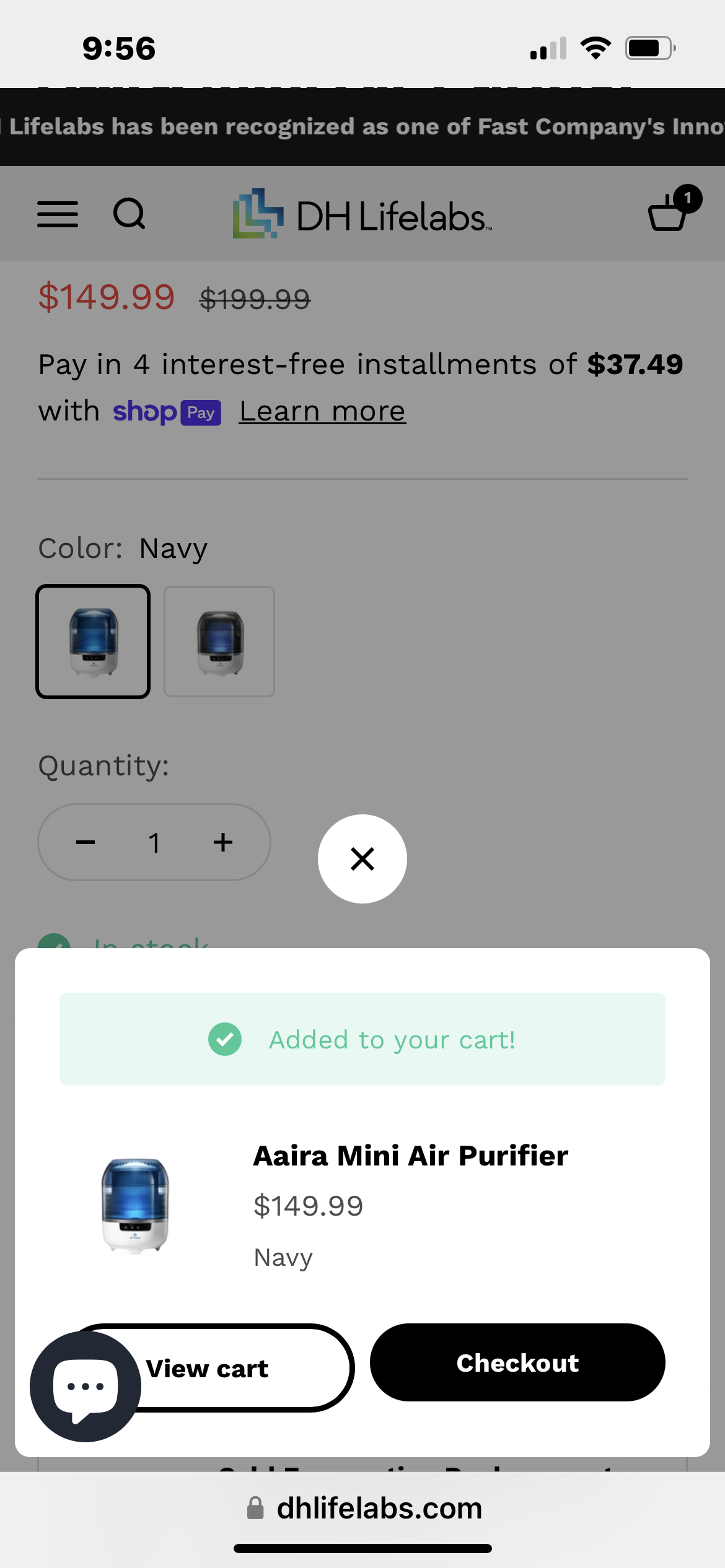 Screenshot of an online shopping cart page showing a mini air purifier, priced at $149.99, in navy color, with options to view the cart or proceed to checkout.